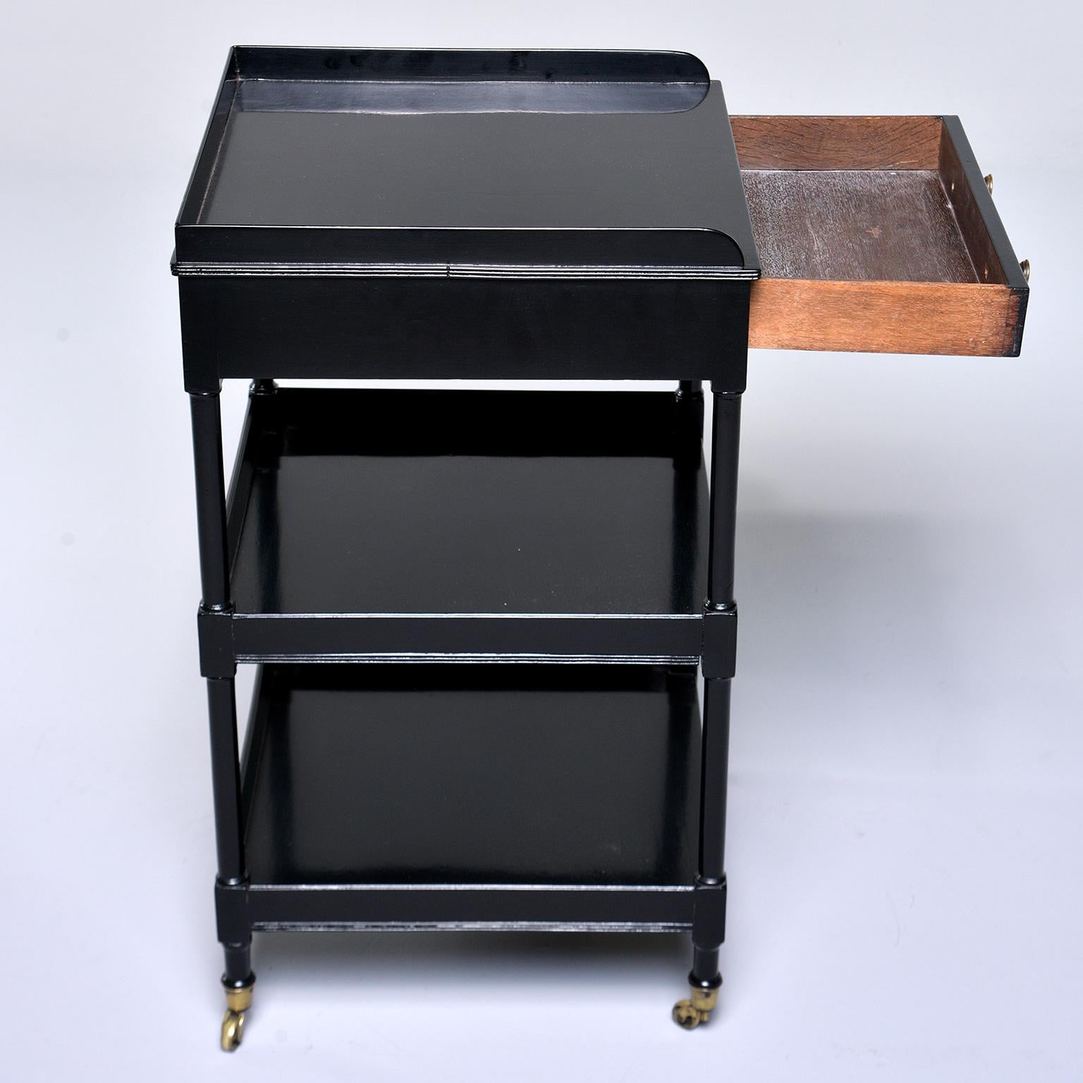 Small Ebonized Étagère on Brass Casters  In Good Condition In Troy, MI