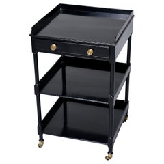 Small Ebonized Étagère on Brass Casters