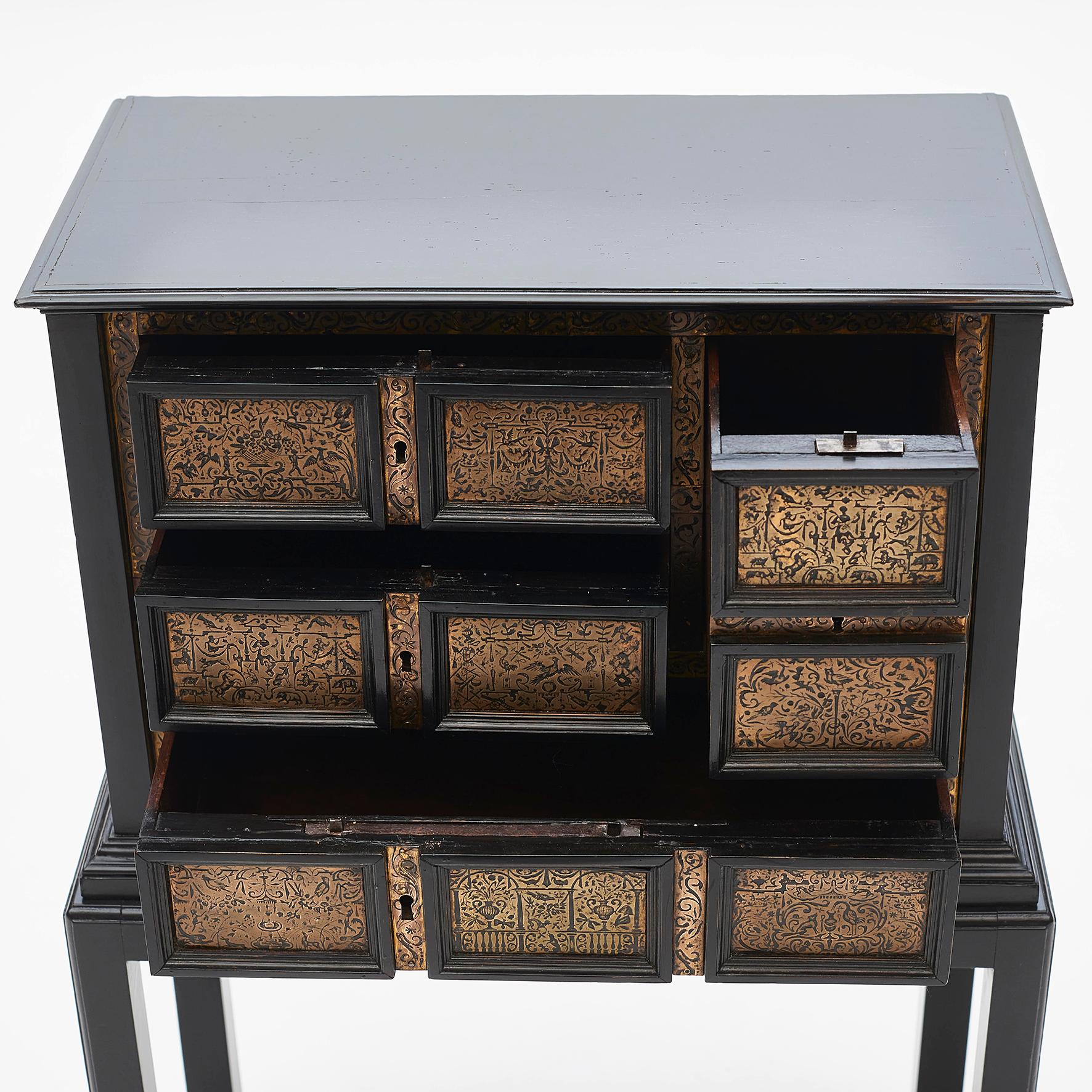 18th Century Small Elegant Baroque Cabinet in Ebonized Wood with Ornamented Brass Engravings