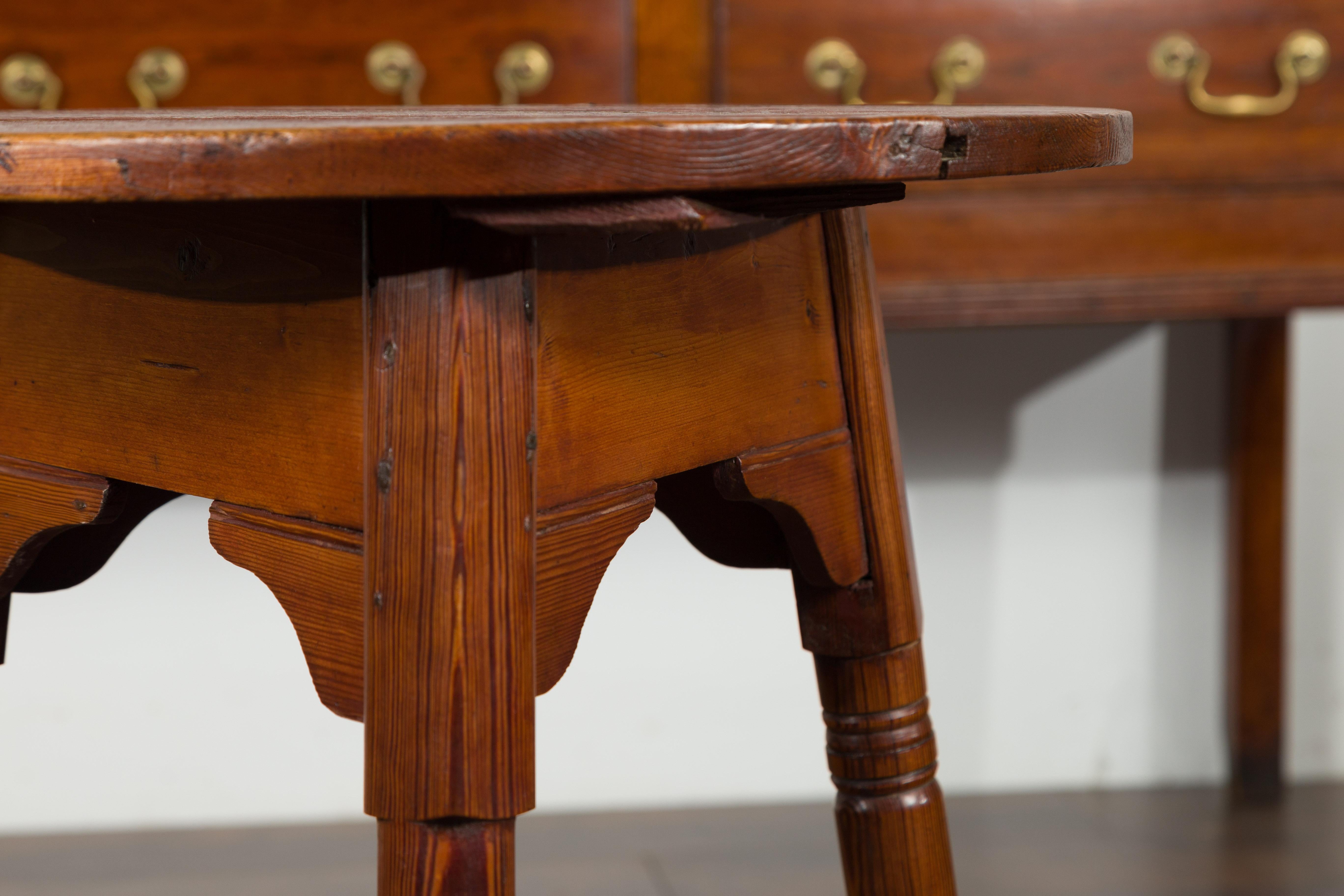 19th Century Small English 1840s Pine Cricket Table with Carved Apron and Turned Legs