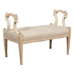 Small English 1860s Upholstered Bench with Carved Eagle Heads and Natural Finish