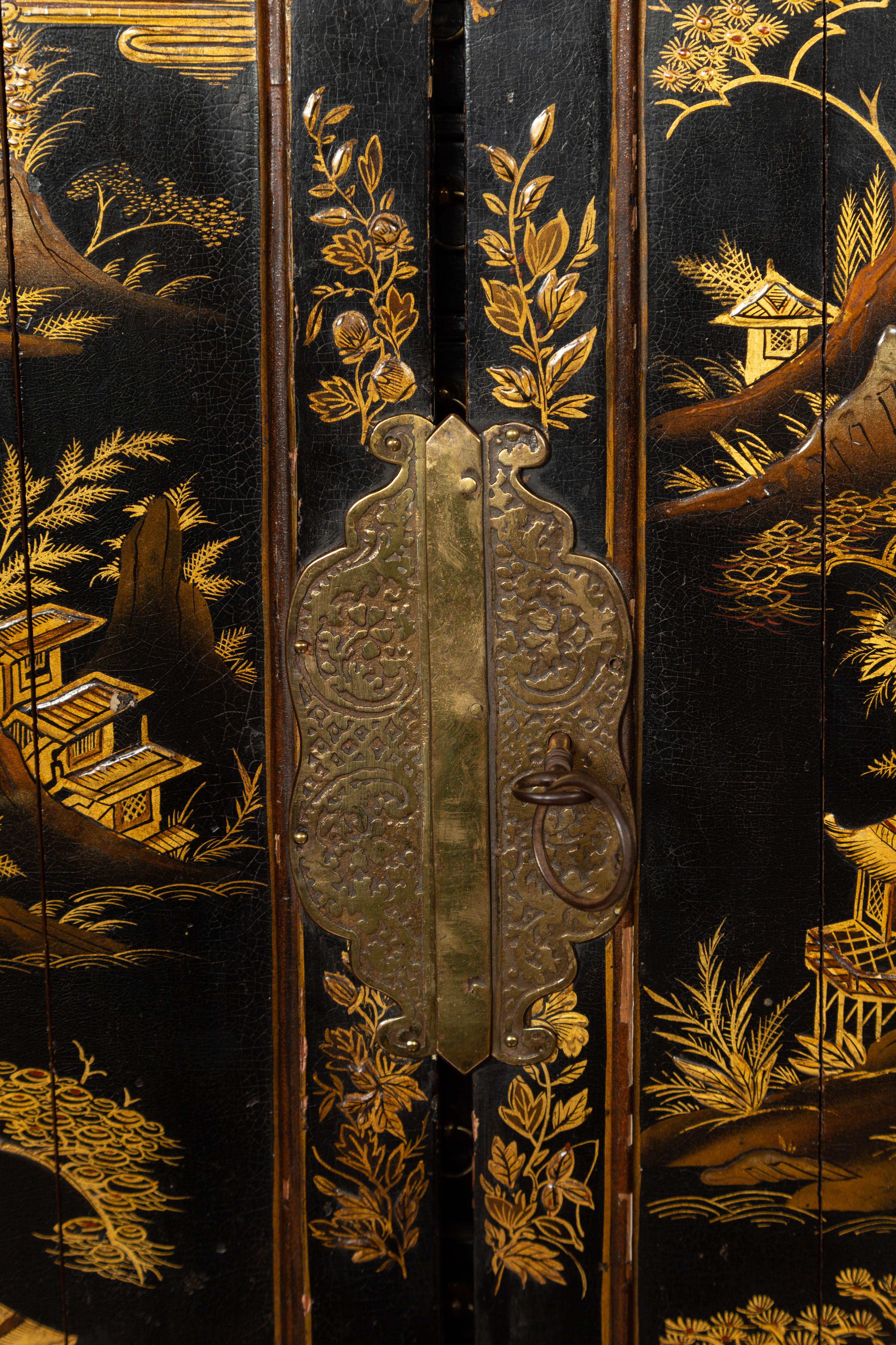 Small English 1890s Black and Gold Chinoiserie Cabinet with 10 Hidden Drawers In Good Condition In Atlanta, GA