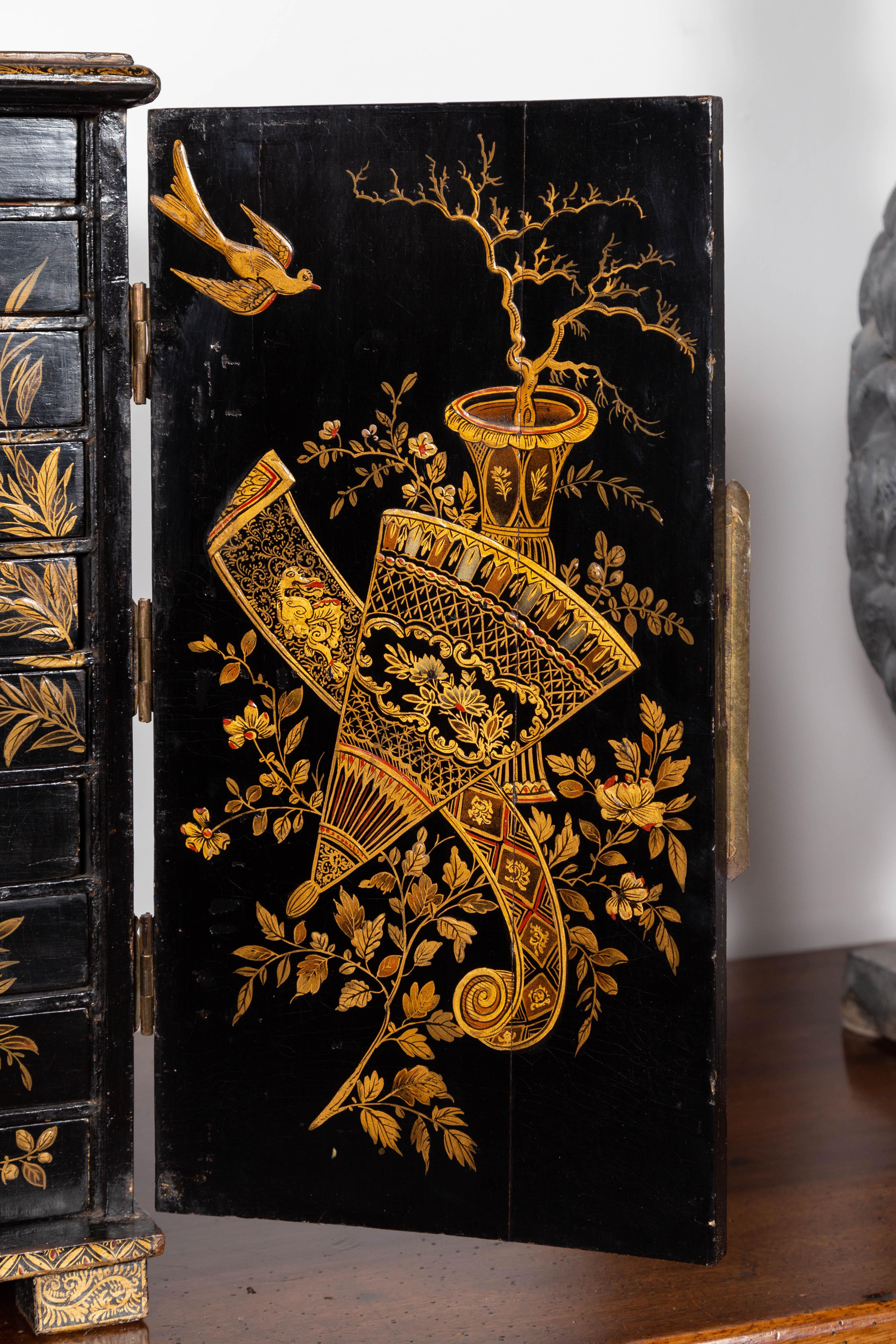 Wood Small English 1890s Black and Gold Chinoiserie Cabinet with 10 Hidden Drawers