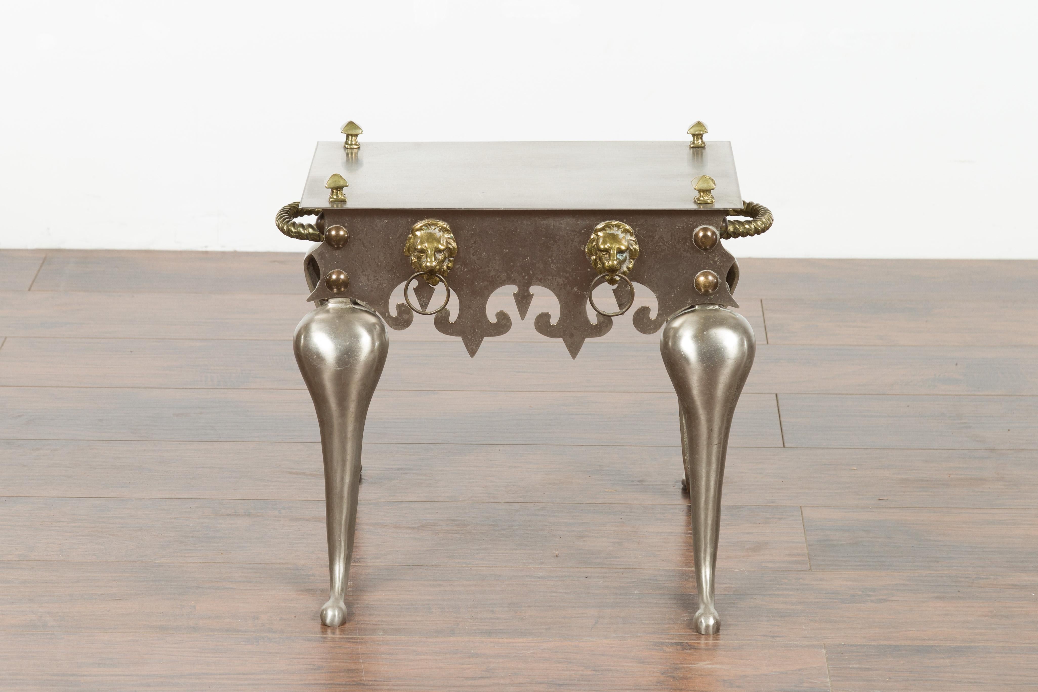 Small English 1900s Steel and Brass Side Table with Lion Heads and Curving Legs In Good Condition For Sale In Atlanta, GA