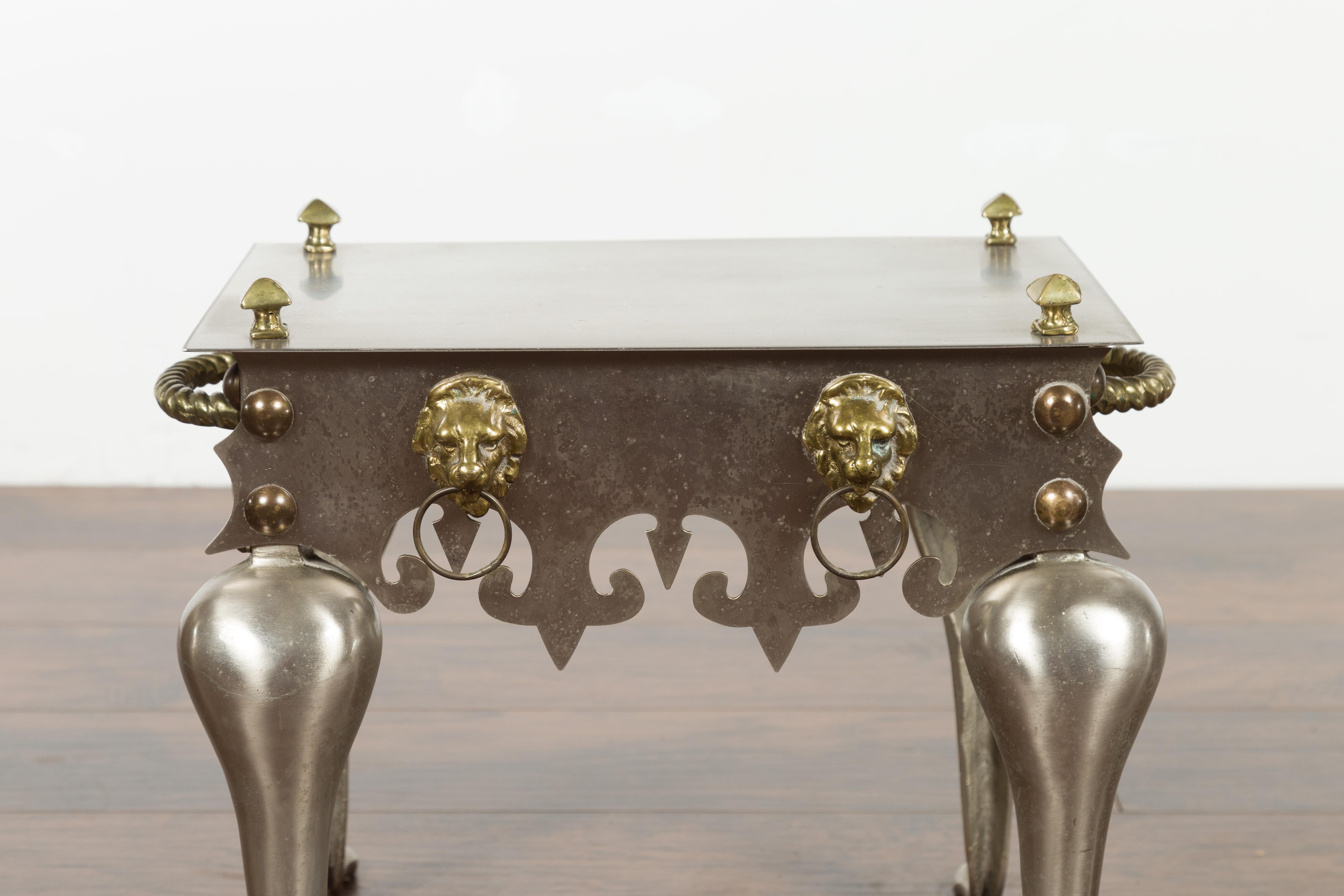 Small English 1900s Steel and Brass Side Table with Lion Heads and Curving Legs For Sale 1