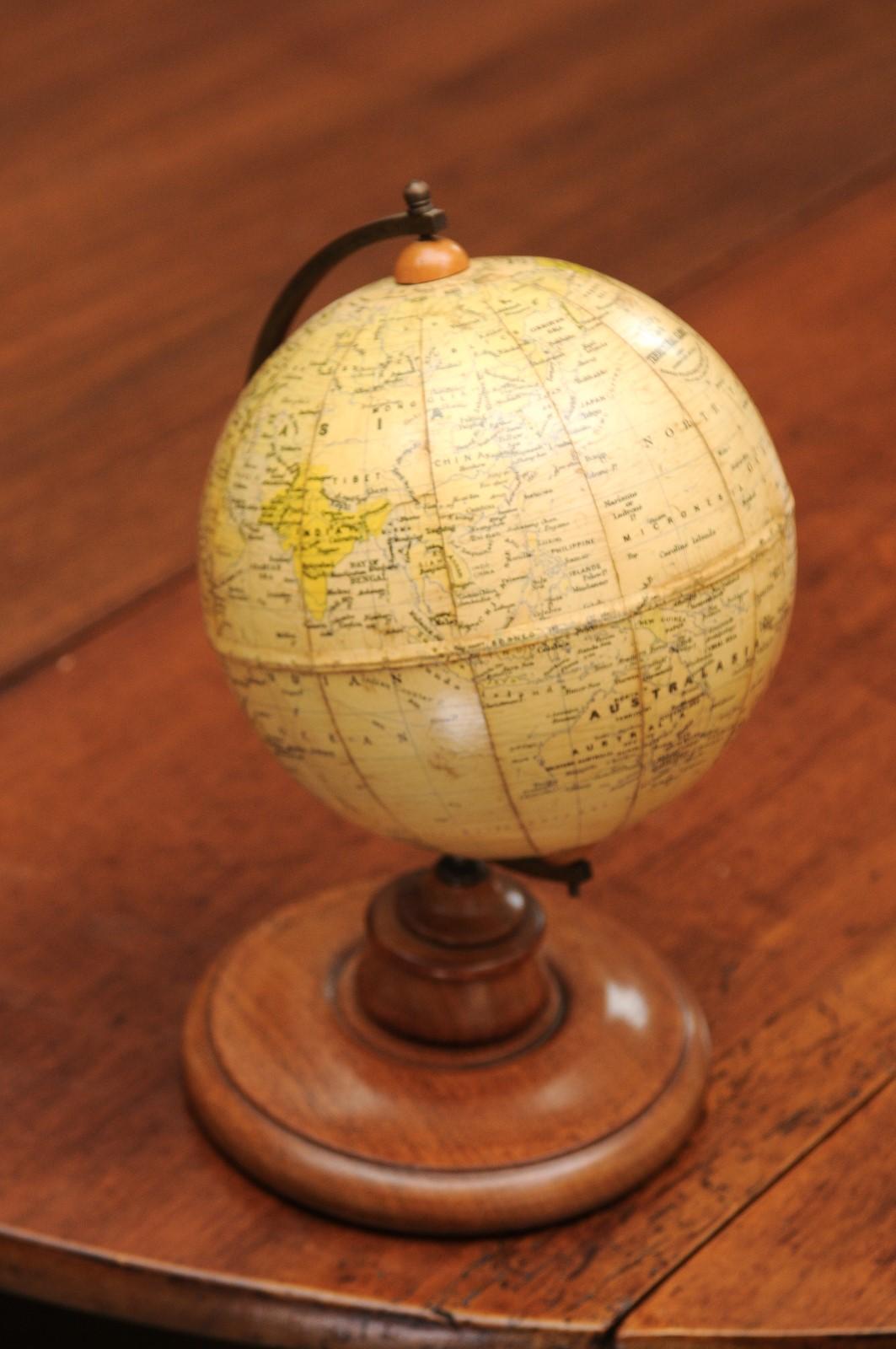 Small English 20th Century George Philip Terrestrial Globe on Wooden Base 1