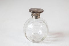 Small English 20th Century Glass Vanity Bottle with Silver Lid and Etched Design