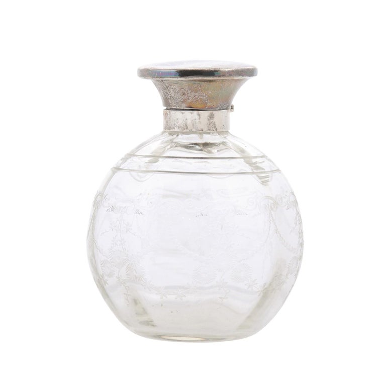 Small English 20th Century Glass Vanity Bottle with Silver Lid and Etched Design For Sale