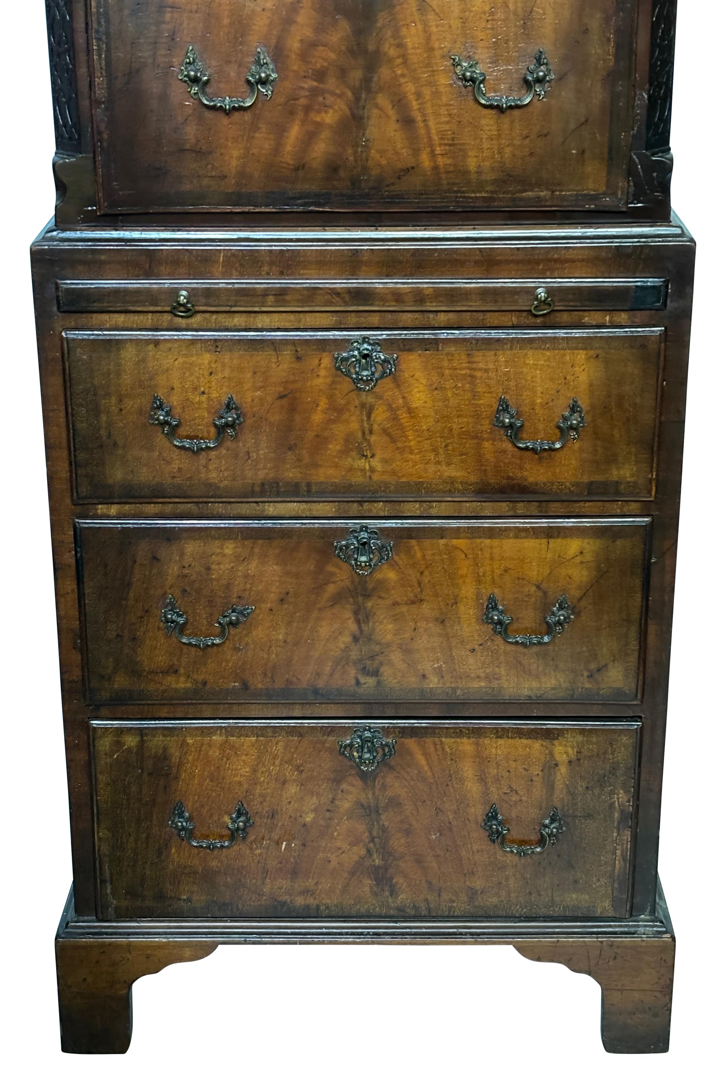 An unusual smaller size George II style / Chippendale style mahogany chest on chest.
Exceptional quality, bench made (hand crafted) mahogany veneer over solid oak. This is a very accurate representation of this period.
In excellent