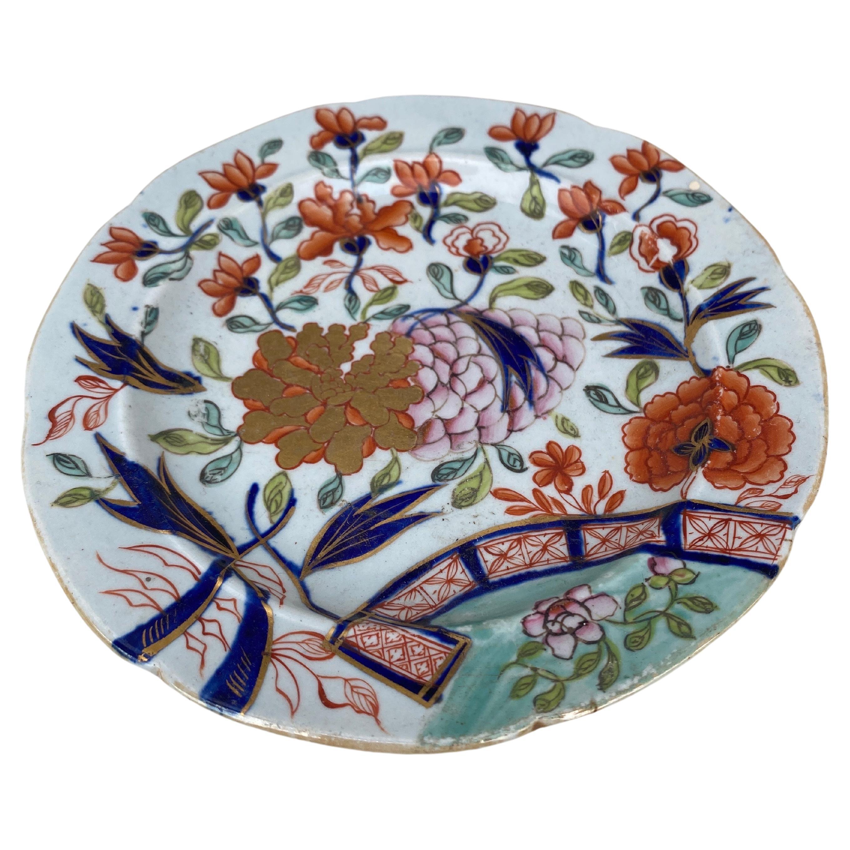 Pequeño plato inglés de piedra de hierro de hacia 1890.
Chinoiserie o estilo Imari.
15 cm de diámetro.