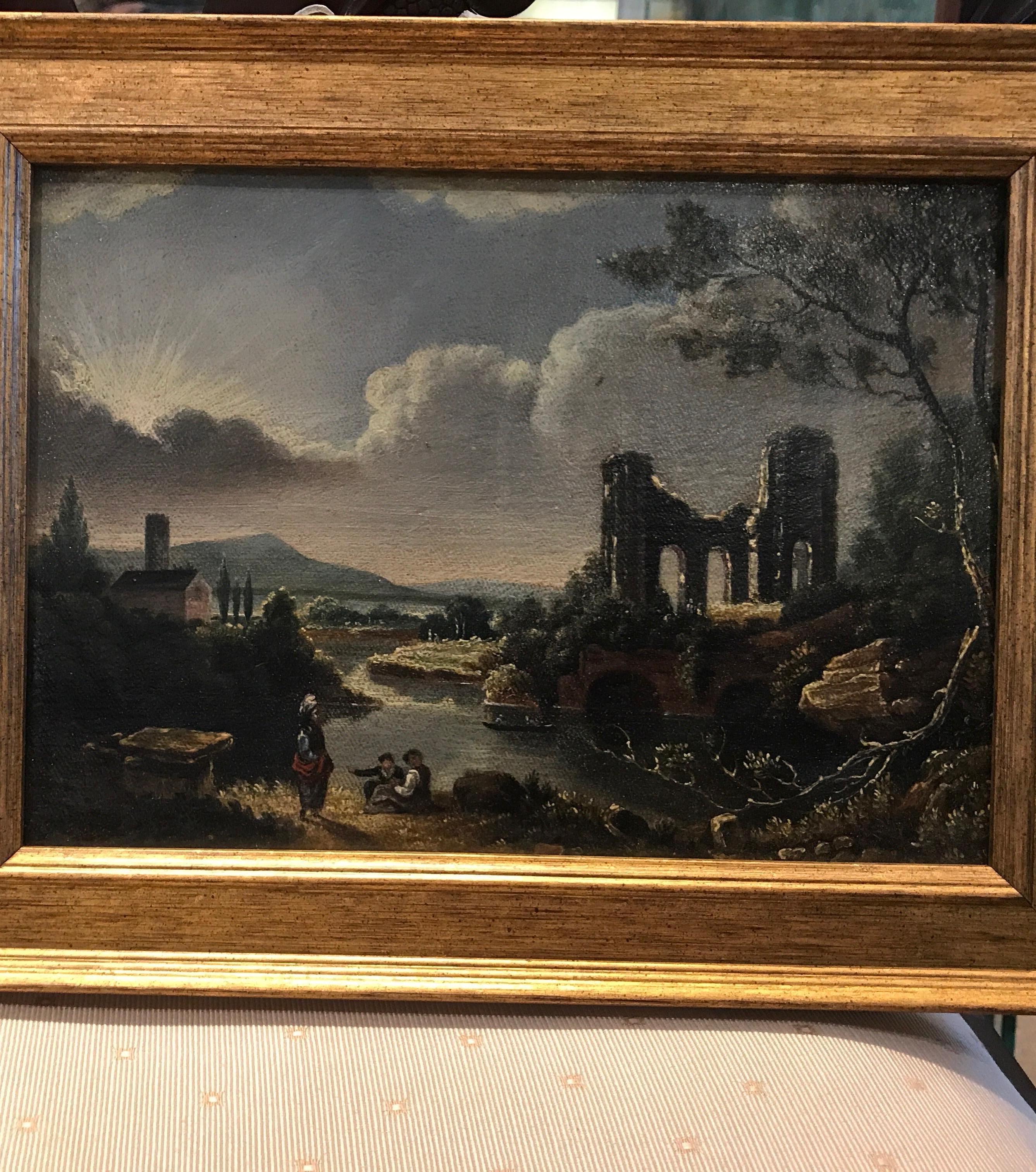 English oil on canvases of a village scene with ruins and river. The painting has been re-scratched and a recent gilt wood frame. England, circa 1850, 11 inches wide, 8.5 inches tall framed, Unframed 8.75 by 6.5.