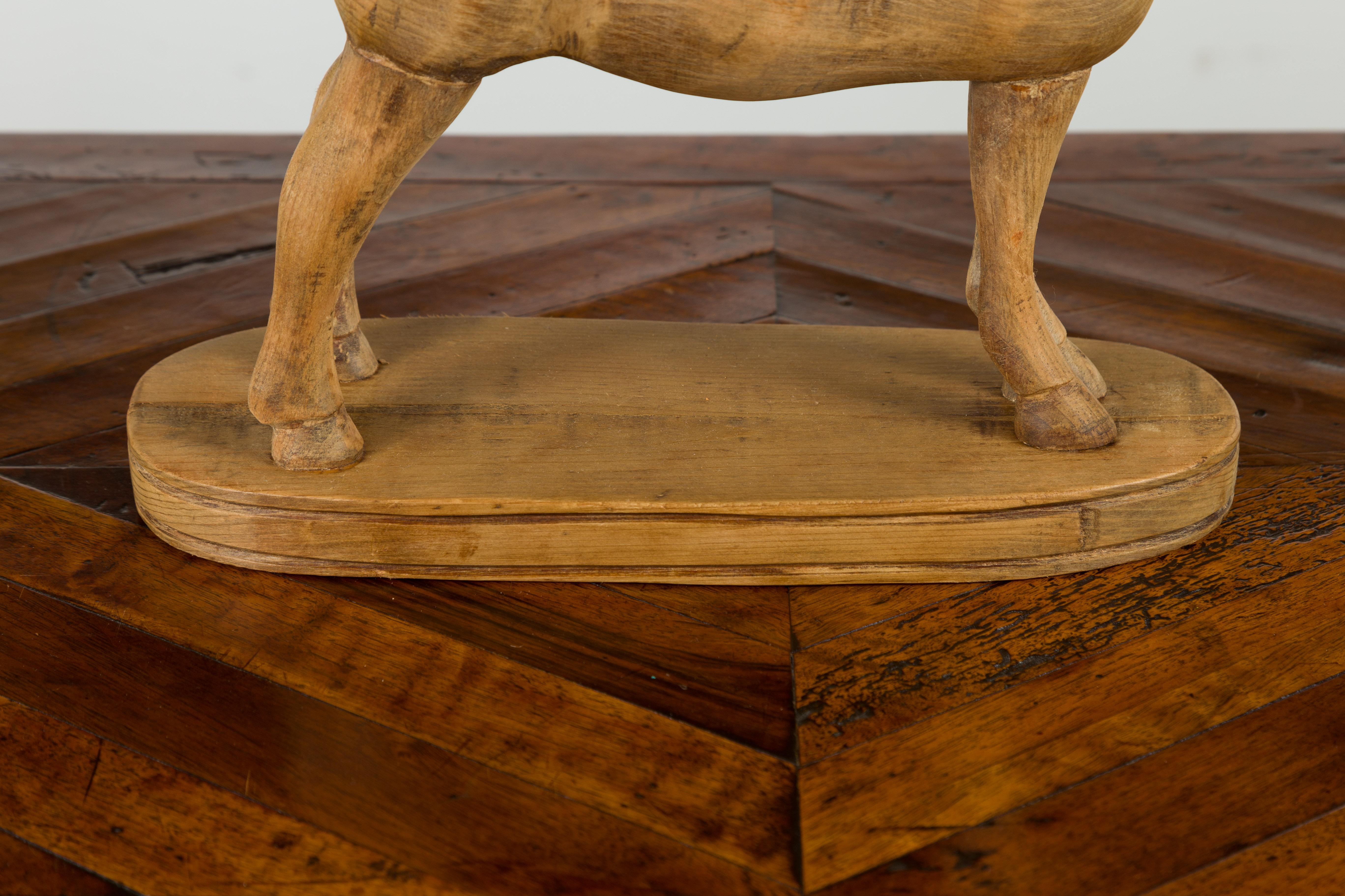 20th Century Small English Turn of the Century Carved Pine Horse on Oval Base For Sale