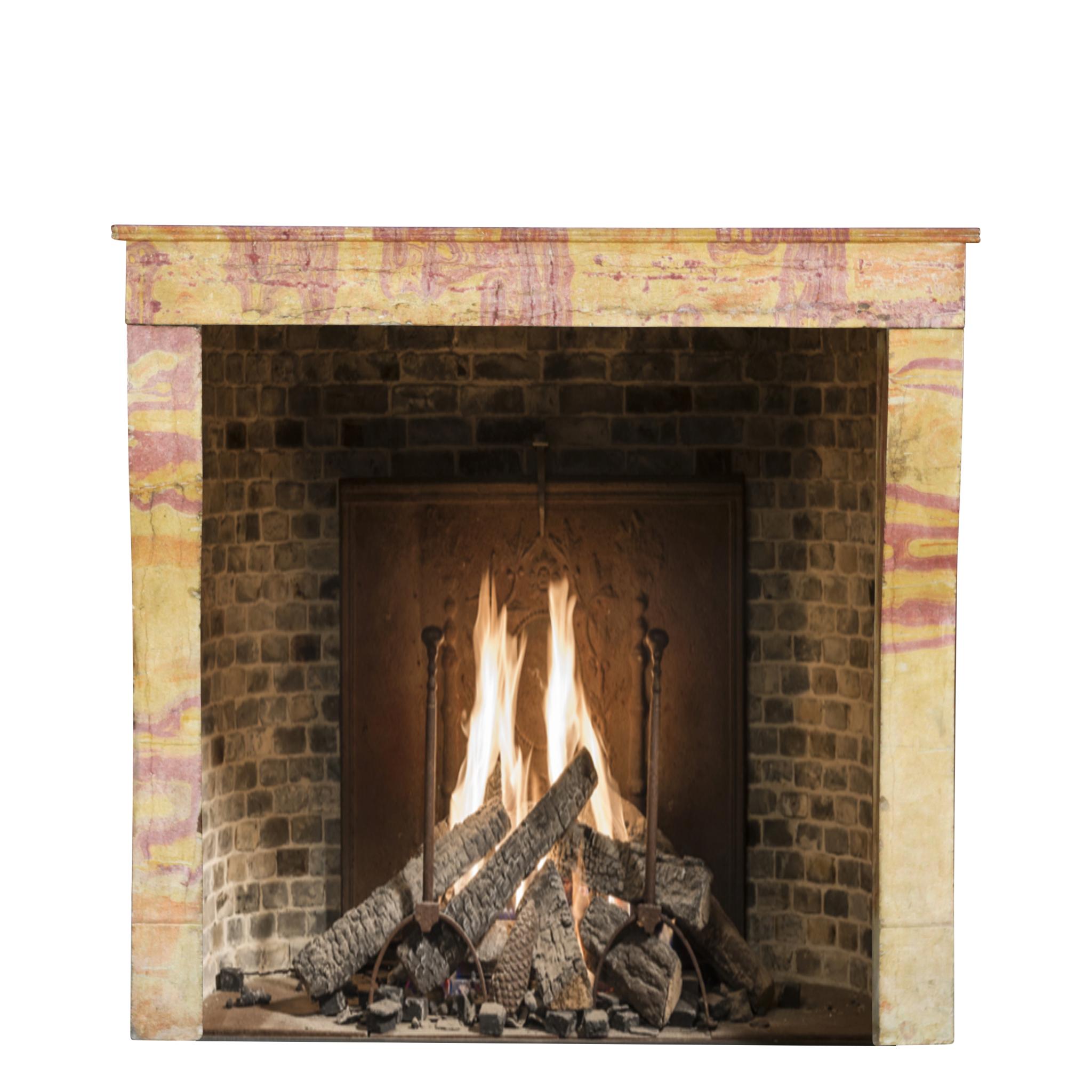 Hand-Carved Small European Fireplace Surround in Multicolour French Burgundy Stone  For Sale