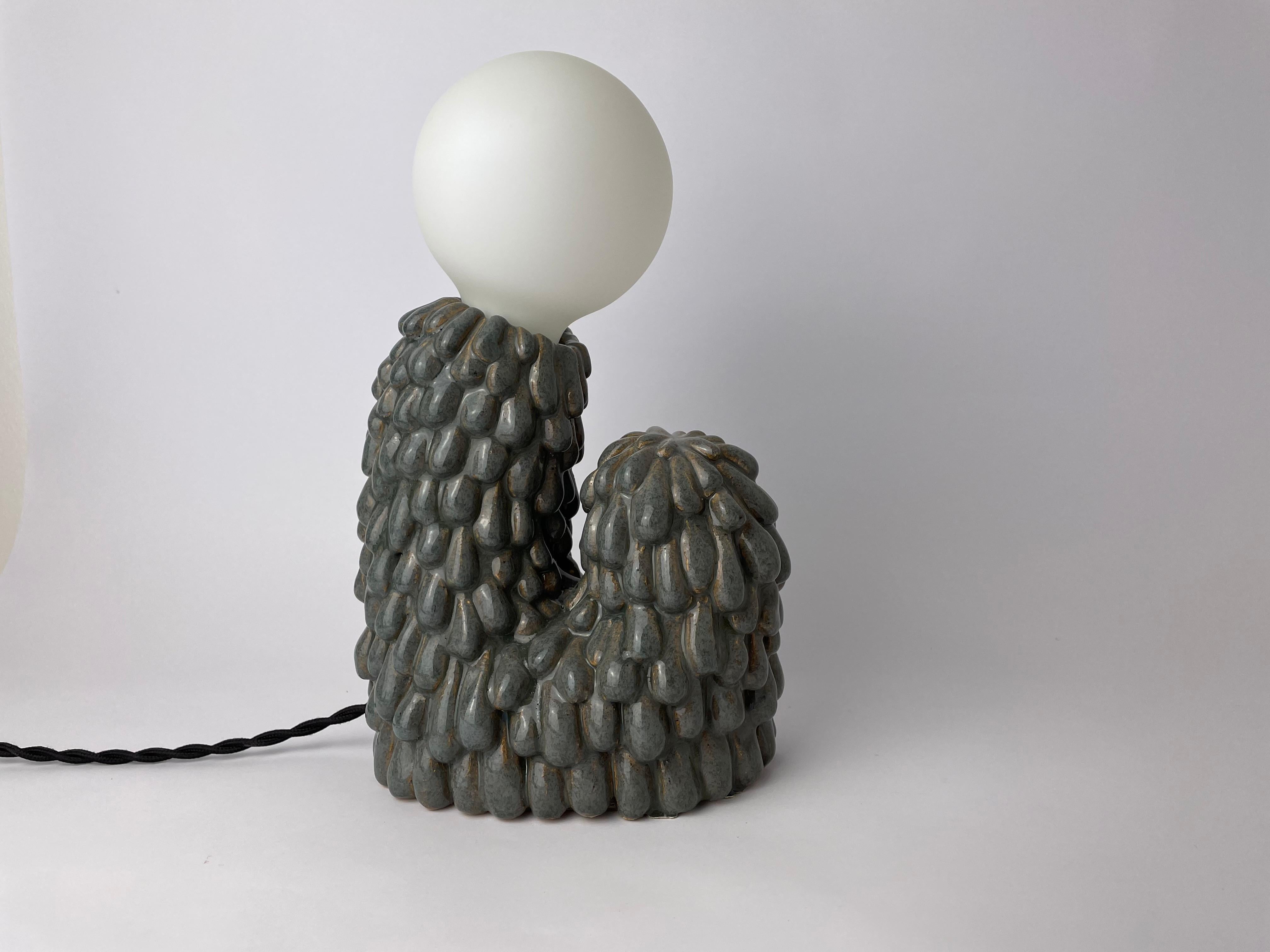 Small evolve lamp by HS studio.
Morphic collection.
Dimensions: 28 x 18 x 9cm.
Materials: ceramic.

Also available: 43 x 40 x 15 cm.

Hannah Simpson is a ceramic artist, based in Kent, UK. With a passion for creating unique items, Hannah's