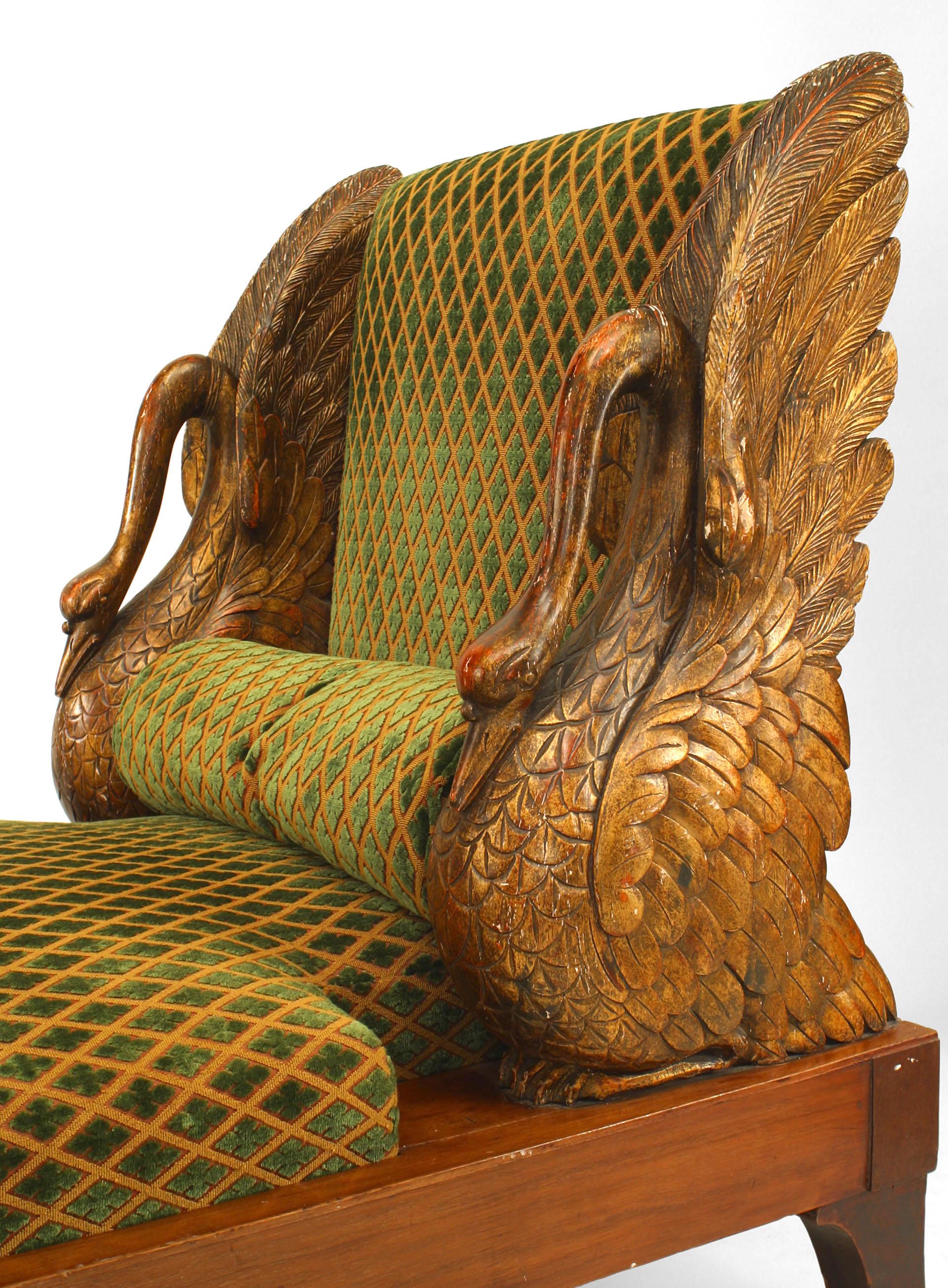 Russian (circa 1810) mahogany diminutive recamier with gilt swan carved sides and ball & claw feet front feet and upholstered in a cut green velvet
