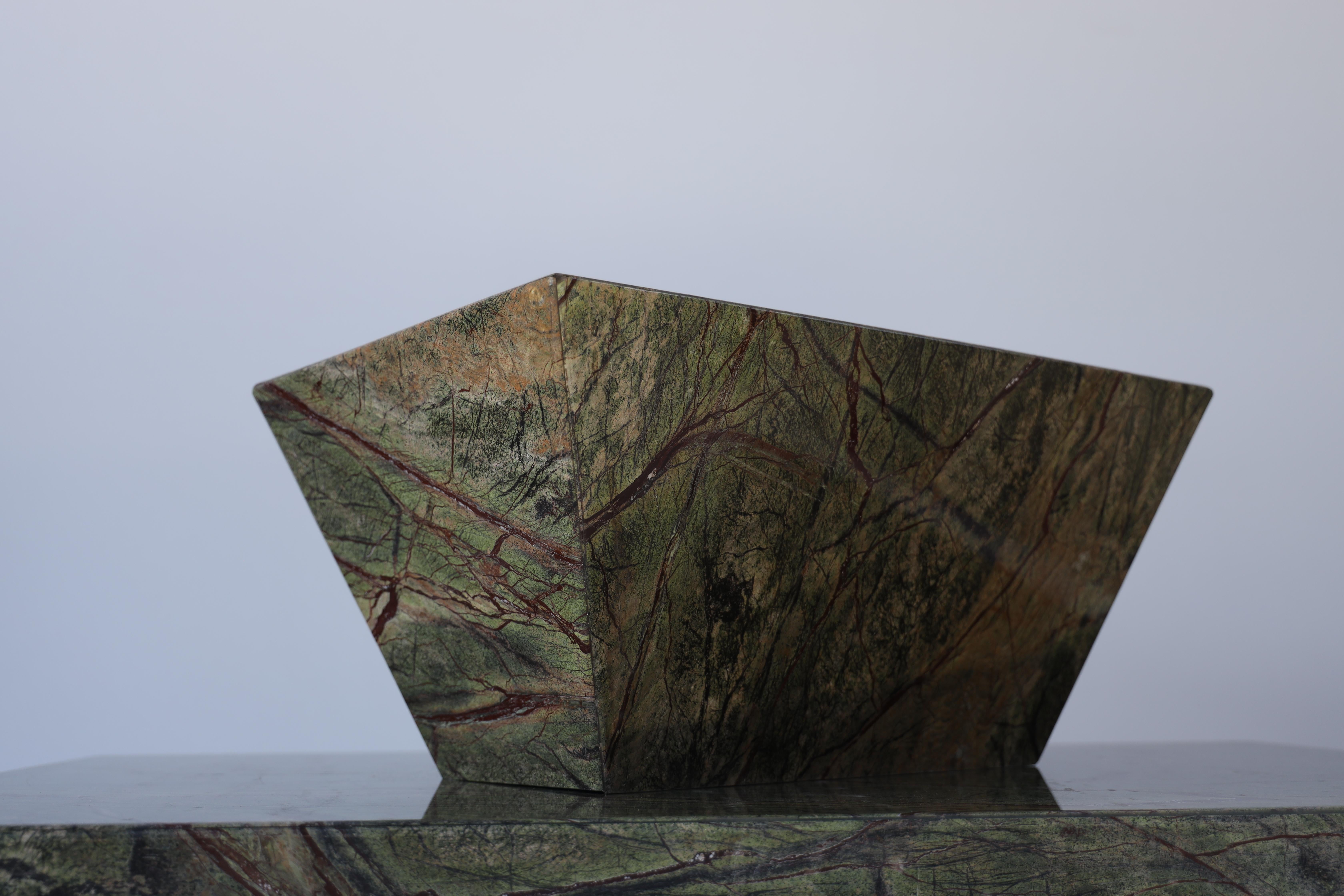 Immerse yourself in the rich beauty of nature with our Forest Green Marble Coffee Table, quarried in India. Handcrafted to perfection, this exquisite piece of furniture brings the serenity and grandeur of India's lush landscapes into your living
