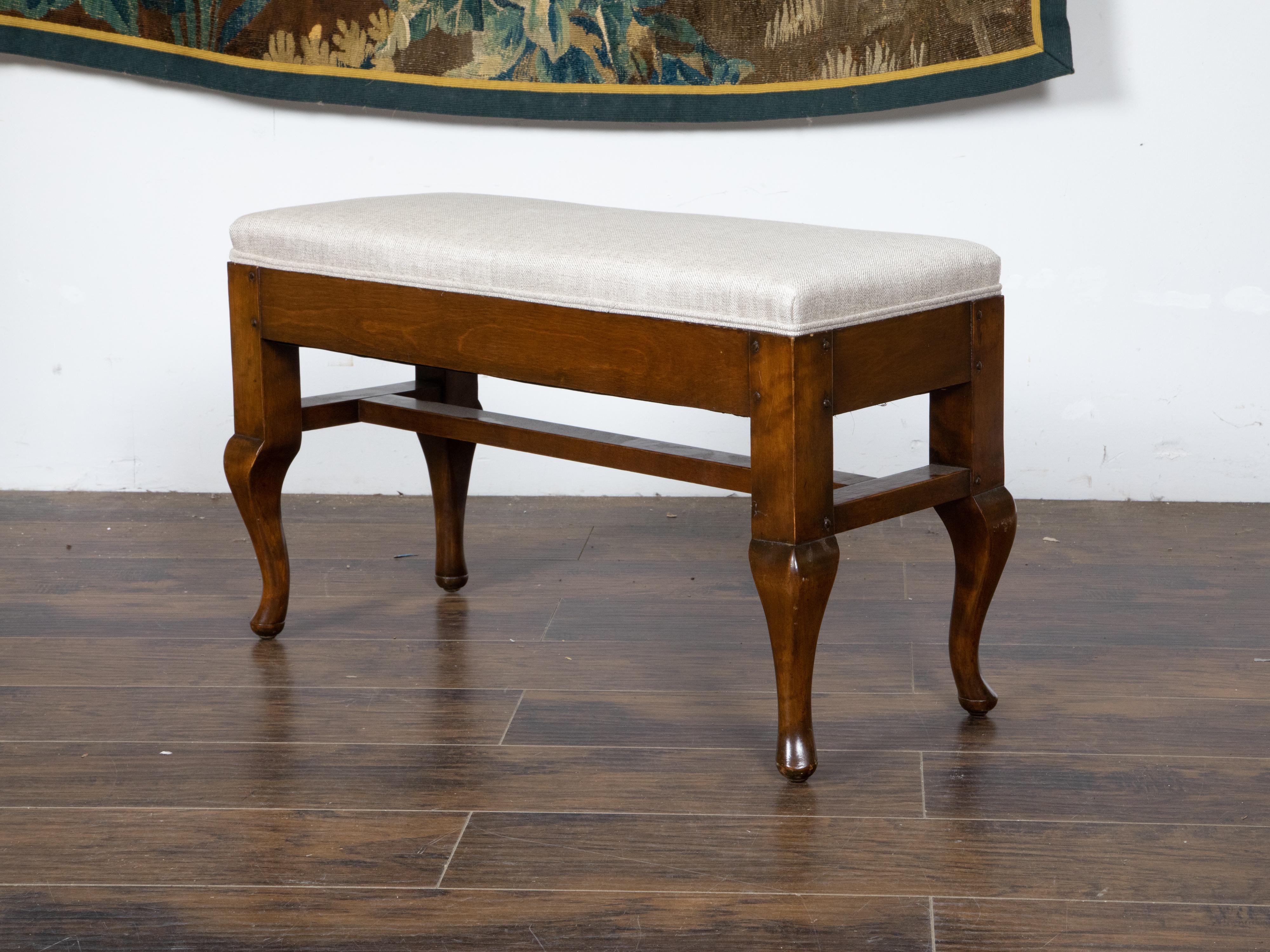 Carved Small French 1800s Wood Bench with Curving Legs, Cross Stretcher and Upholstery
