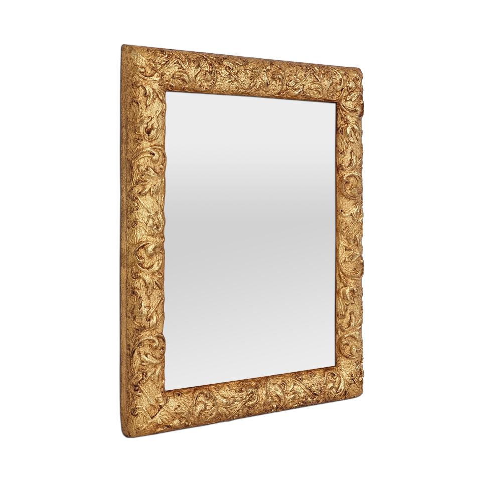Small French antique mirror in patinated giltwood, circa 1900. Antique frame with stylized foliage decor. Re-gilding with patinated leaf. Frame width: 3.5 cm / 1.37 in. Modern glass mirror. Antique wooden rear panel.