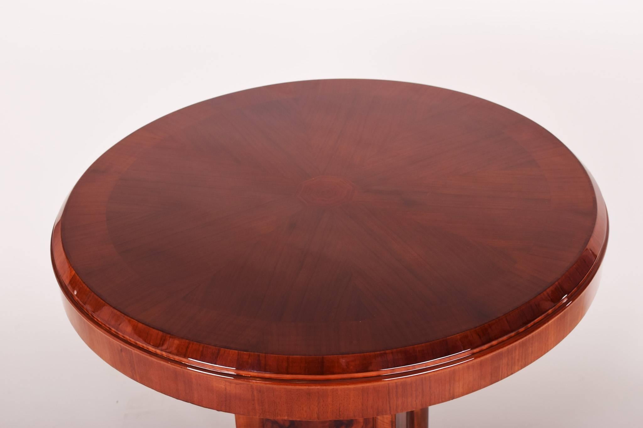 Art Deco table, France.
Completely restored. 
Material: Walnut and palisander.

We guarantee safe a the cheapest air transport from Europe to the whole world within 7 days.
The price is the same as for ship transport but delivery time is really