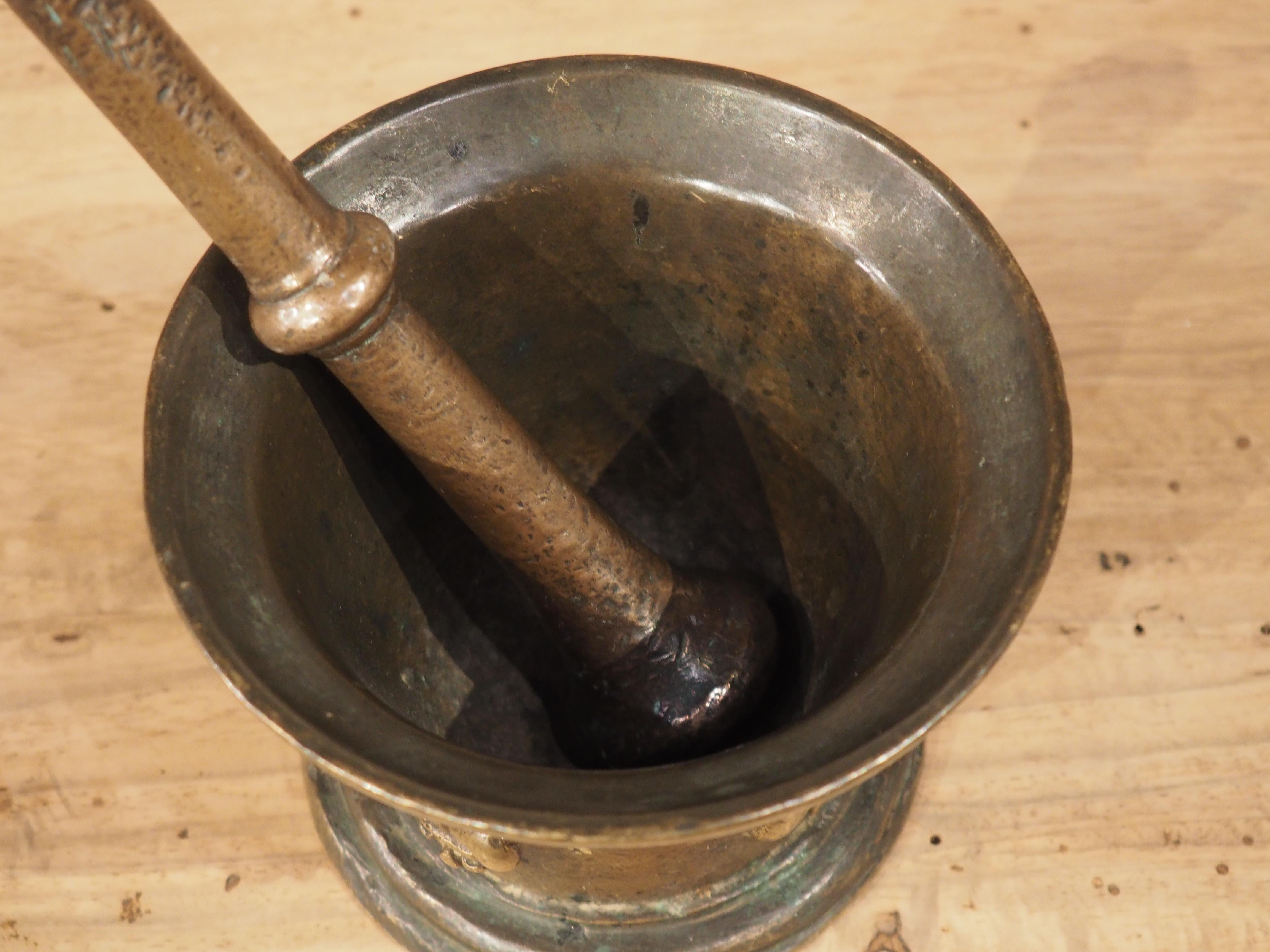 Cast Small French Bronze Mortar and Pestle with Fleur De Lys and Crown, Circa 1700 For Sale