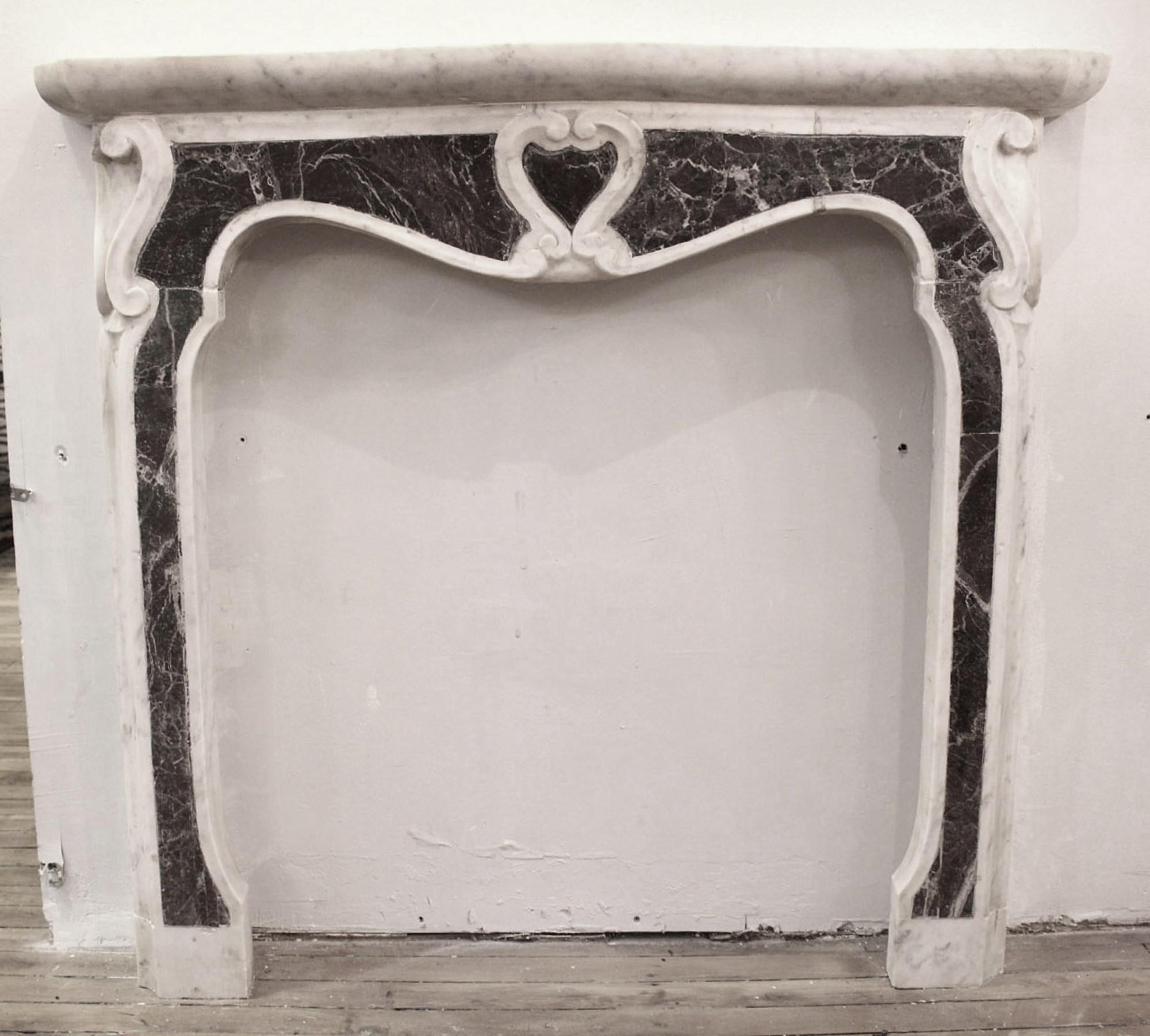 American Small French Carved Marble Mantel Center & Side Scroll Motif For Sale