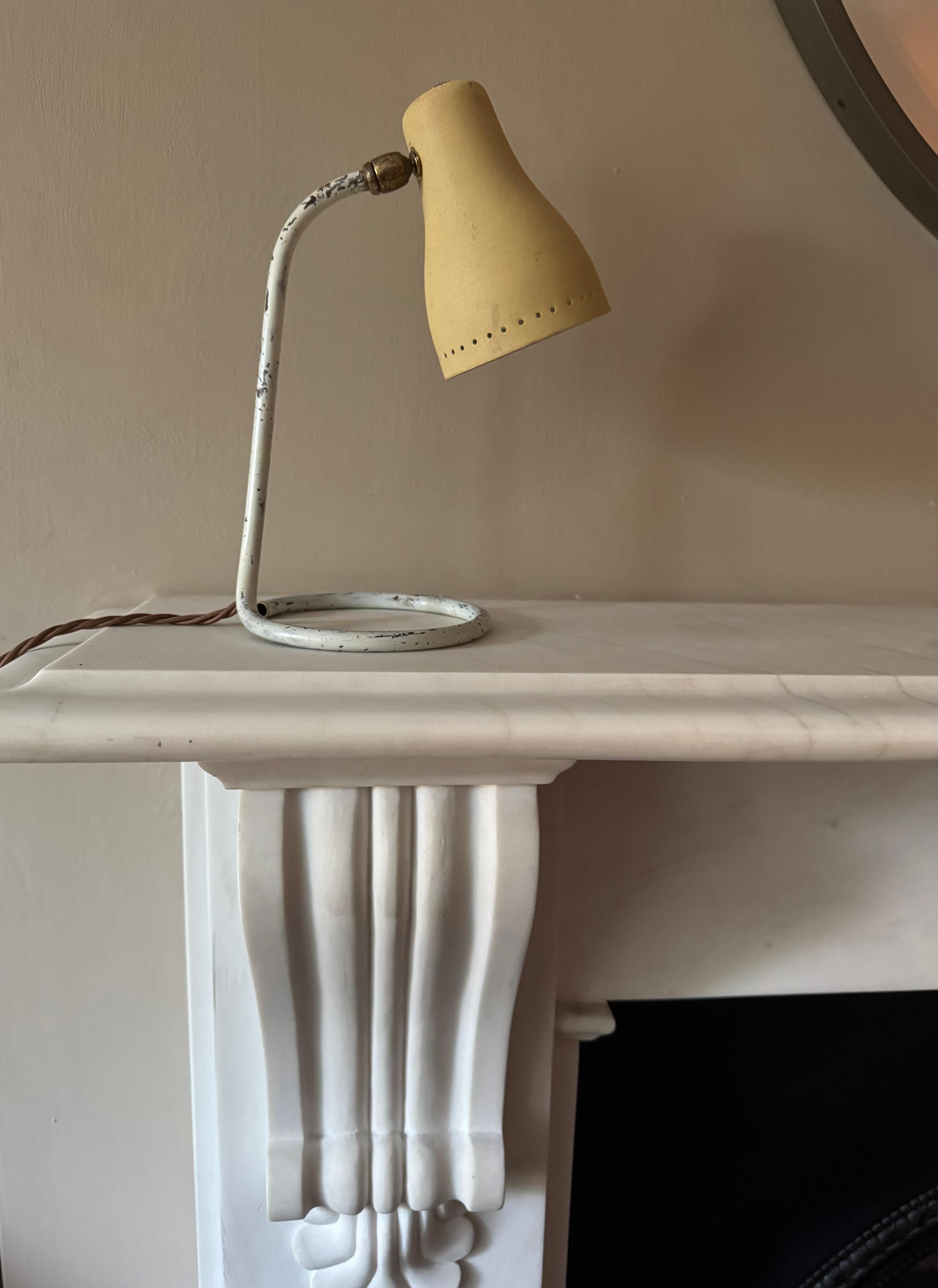 Small French 1950’s cocotte desk lamp. Some paint loss on base and shade but no big dents. Rewired with bronze silk flex. 