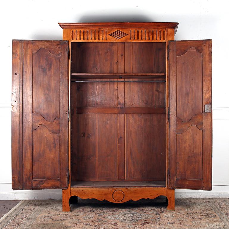 19th Century Small French Country Cherry Armoire. This piece is a great size for a small space.