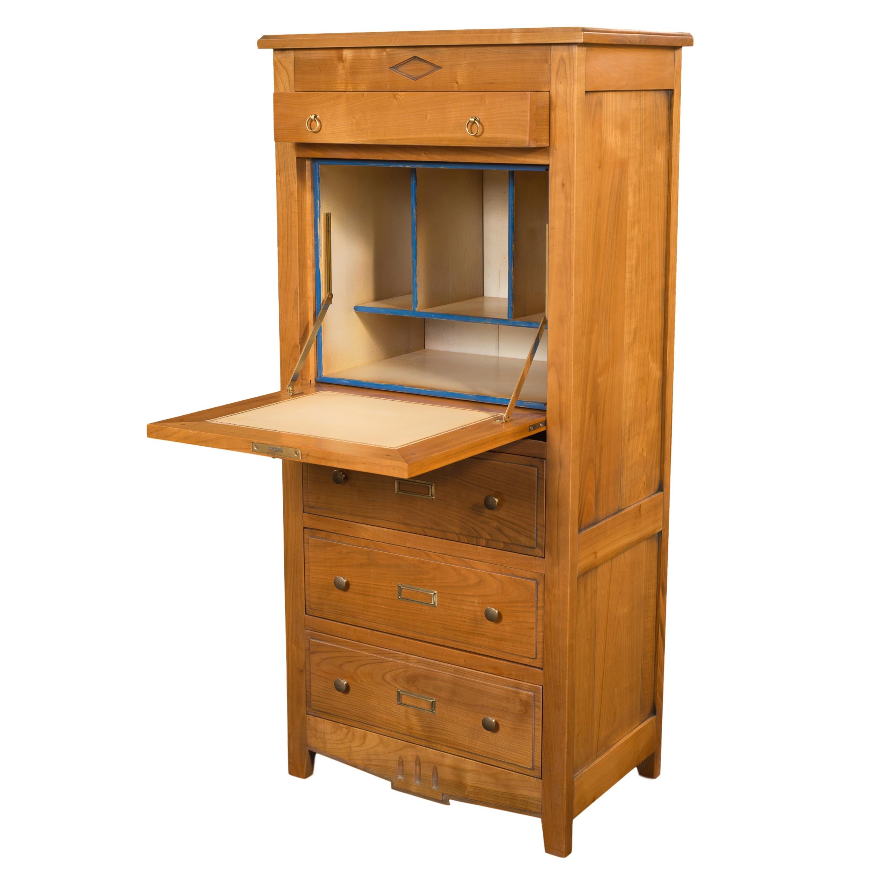 This Secretary is a handmade modernized interpretation of the French Directoire style at the end of the 18th century. This period is remarkable with its straight, classical and timeless lines.

It is made of French Solid Cherry wood. Its classical