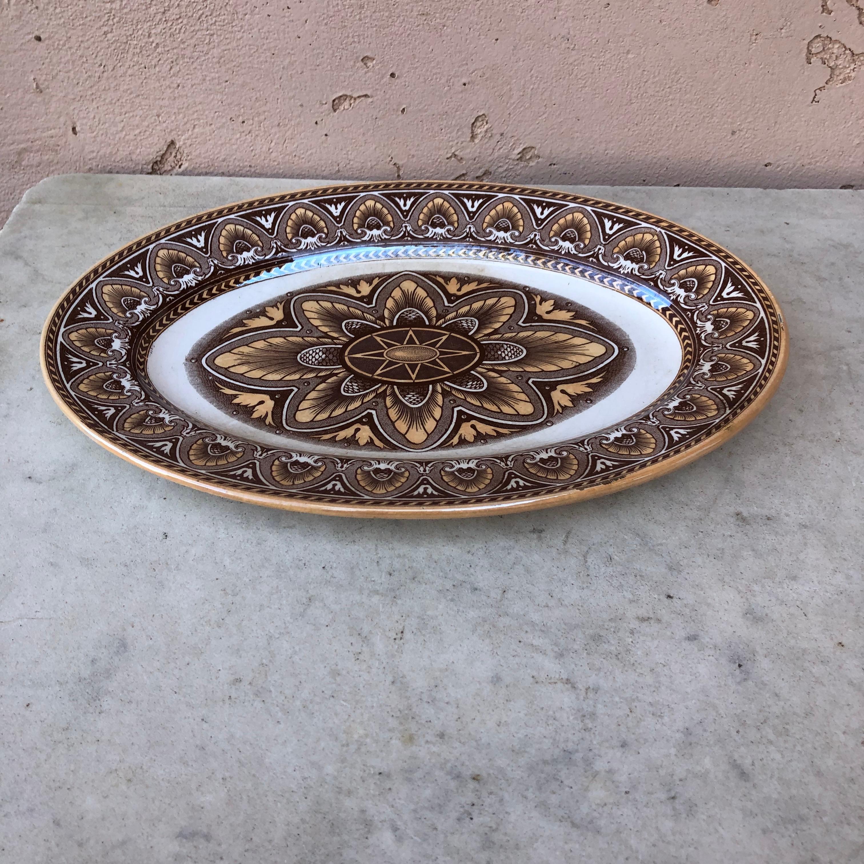 Small French Faience oval platter Model Italia signed Sarreguemines circa 1890.
Rare pattern.
Measures: 11.3
