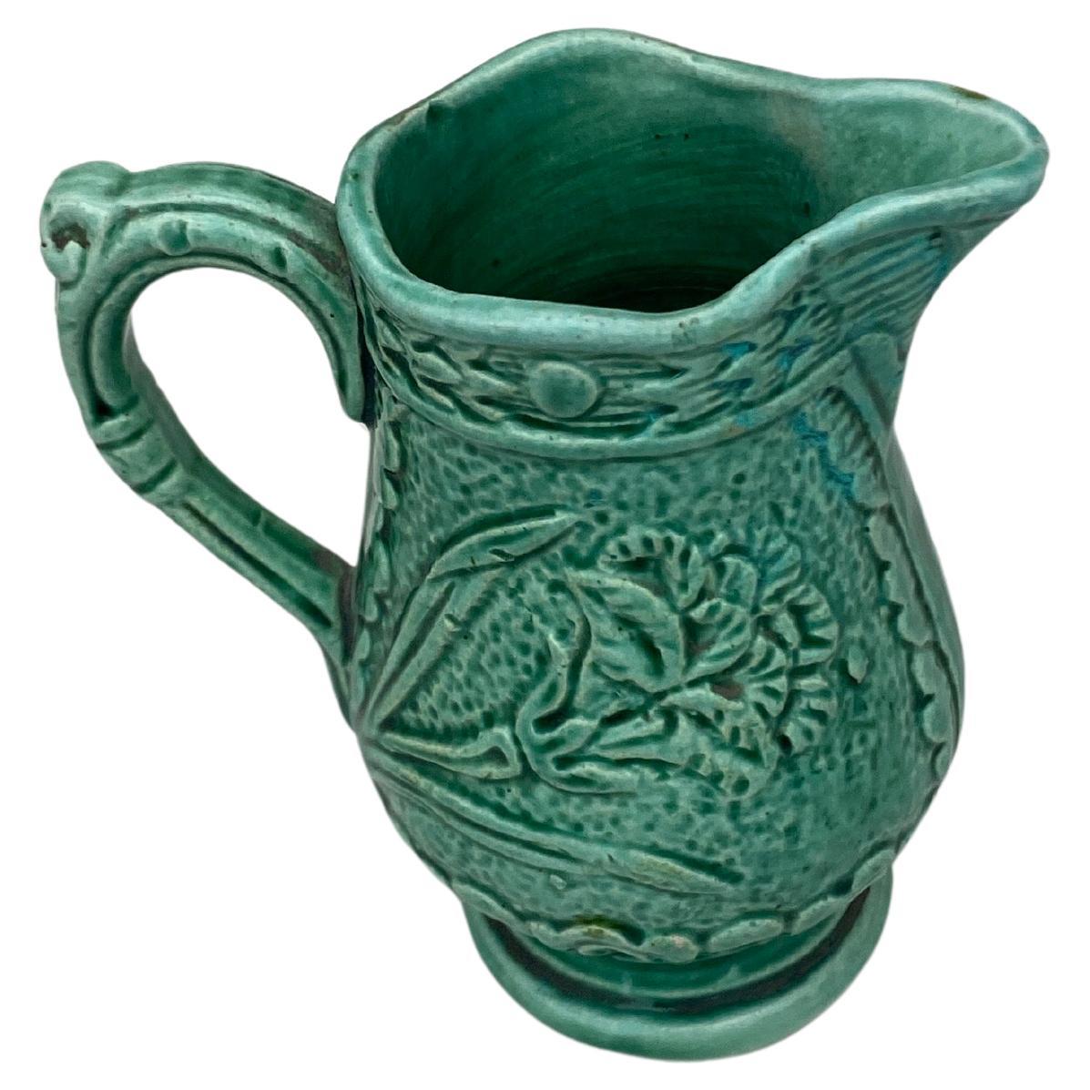 Charming Small French Green Majolica Pitcher Creamer decorated with a carnation.