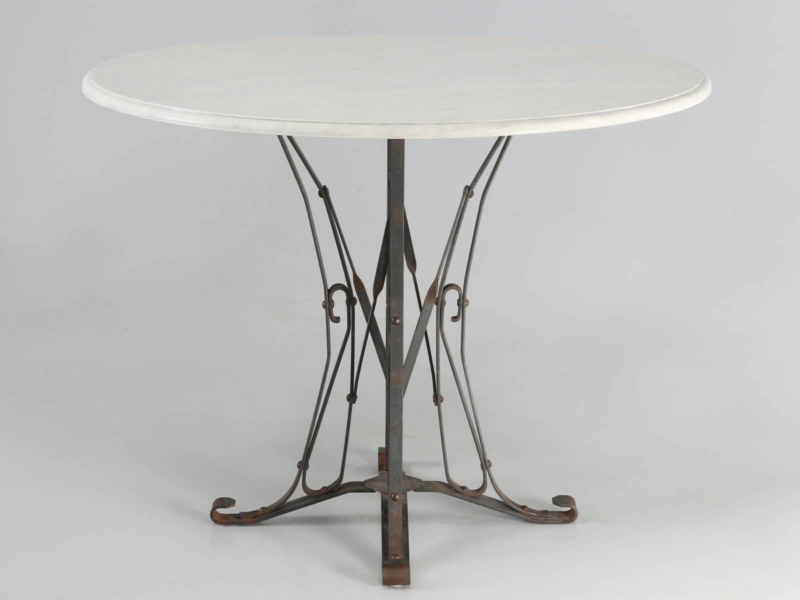 The French kitchen table base was purchased in Brittany, a number of years ago and we just got the table back in trade. French steel base, with a nice patina, but this is not to be confused with an antique base, but rather vintage. We had to replace