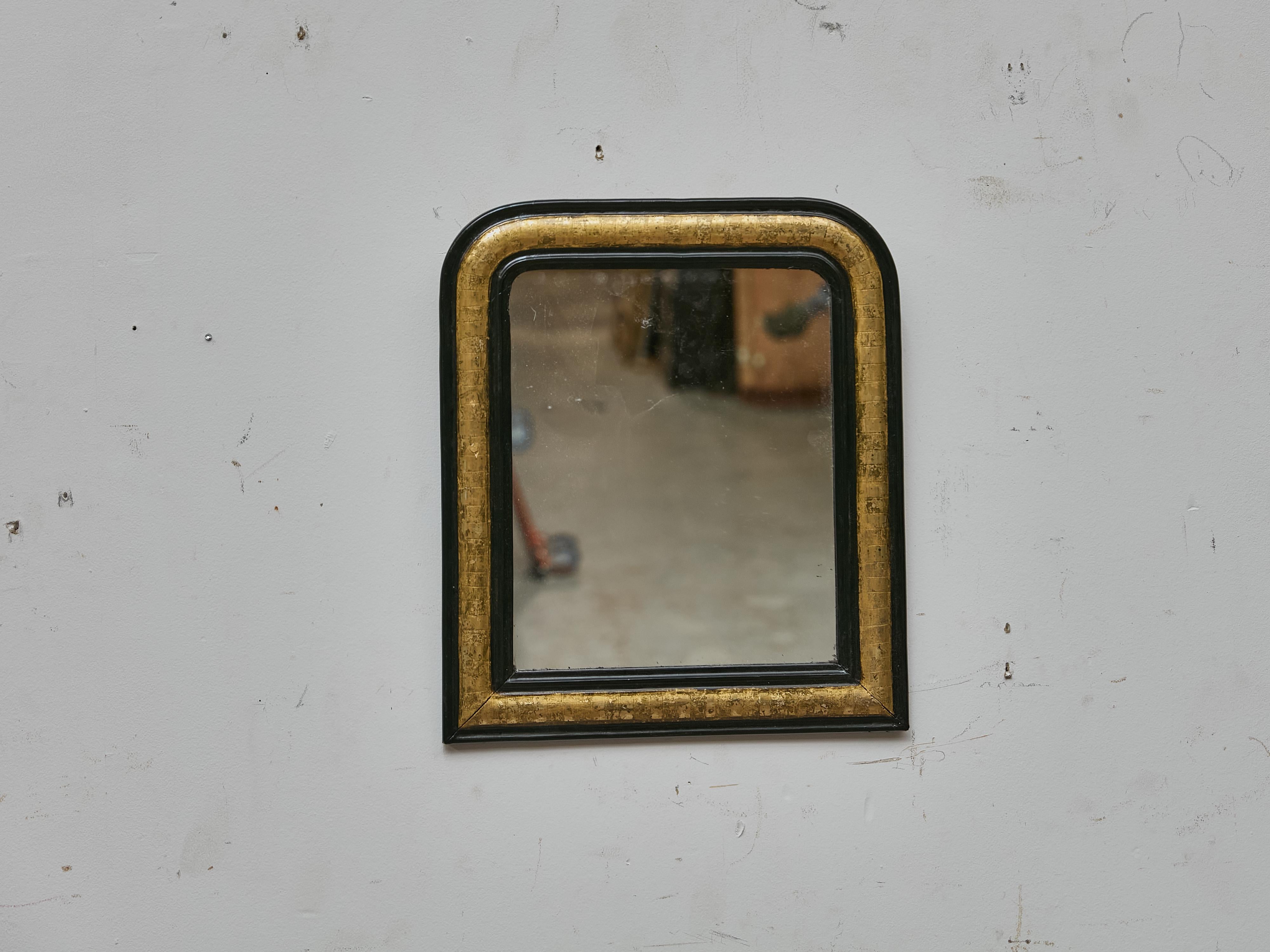 Louis Philippe Small French Louis-Philippe Mirror with Gilt and Black Frame, circa 1850 For Sale