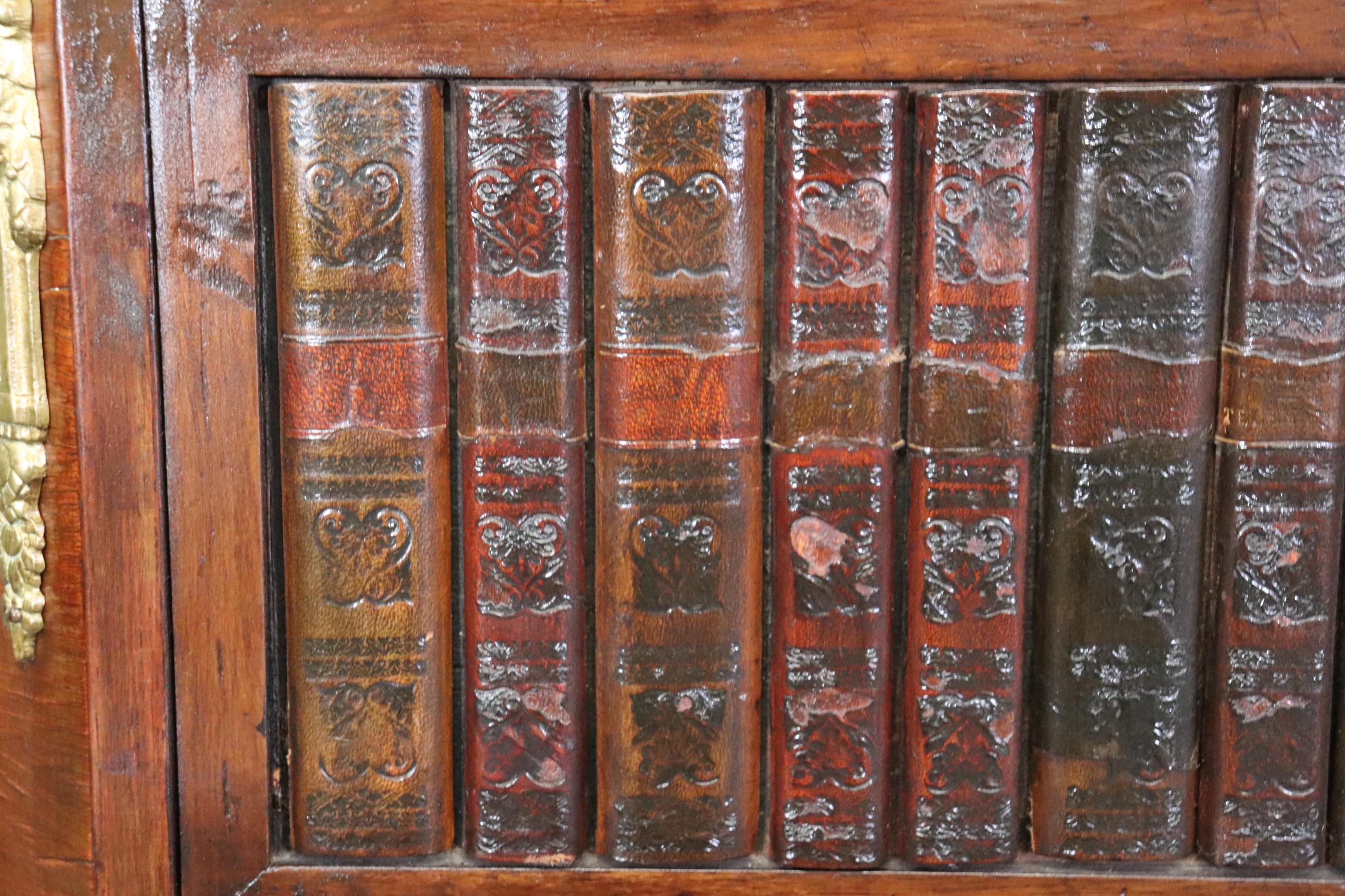 Early 20th Century Small French Louis XV Style Marble Bronze Walnut Bookcase Leather Book Spines For Sale