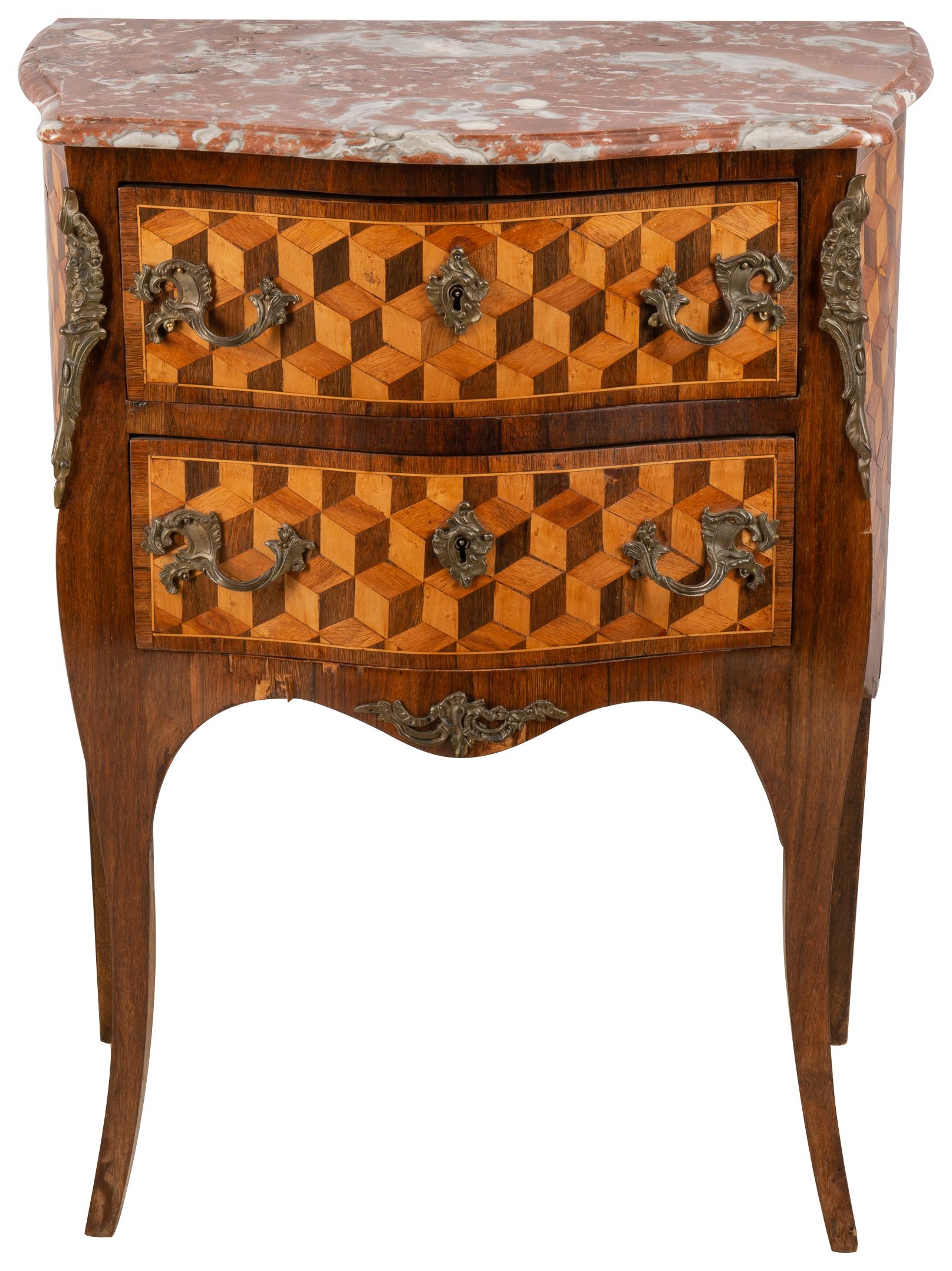 A very stylish late 19th century French Louis XVI style marble topped bombe fronted commode, having wonderful parquetry inlaid decoration to the front and side, ormolu handles, raised on out swept legs with ormolu feet.