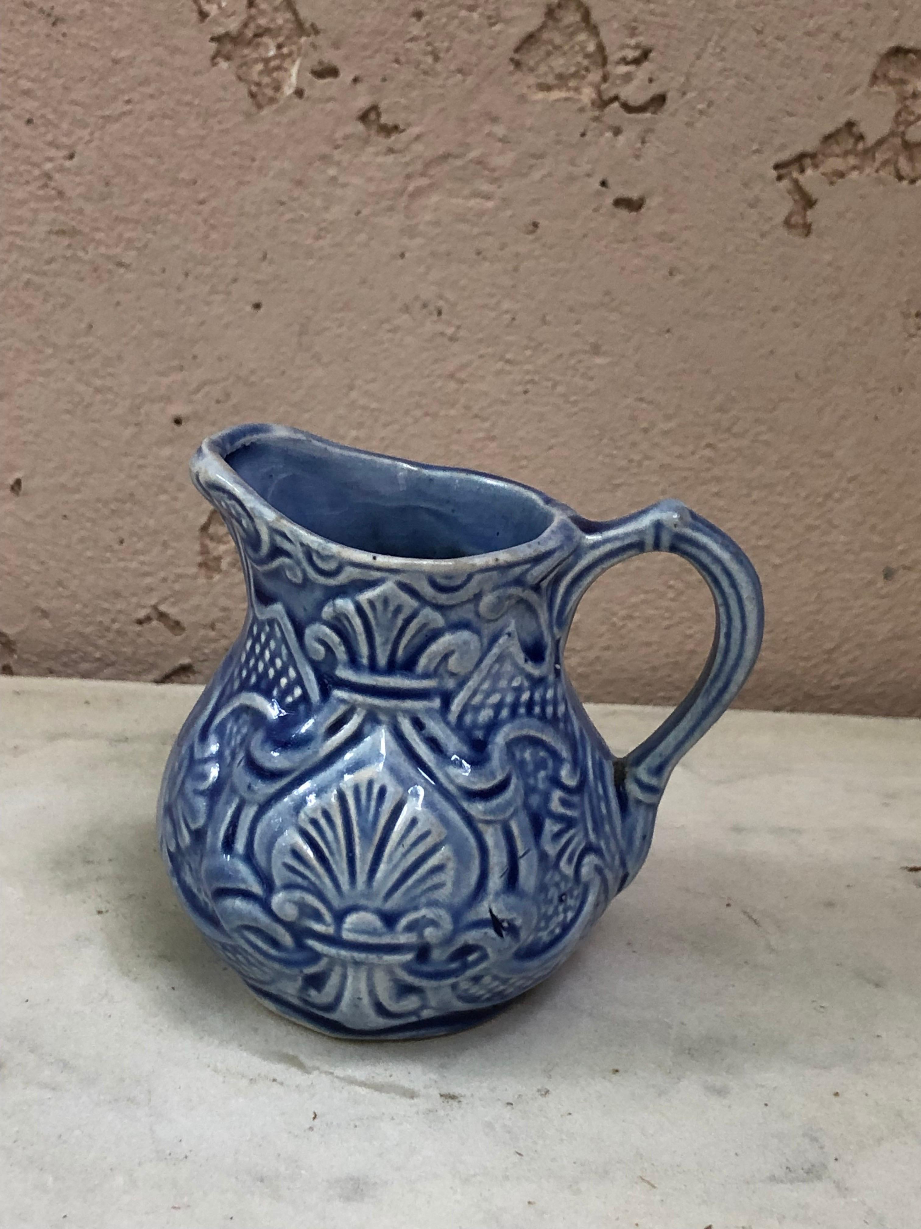 Small French majolica blue creamer pitcher signed onnaing, Circa 1920.