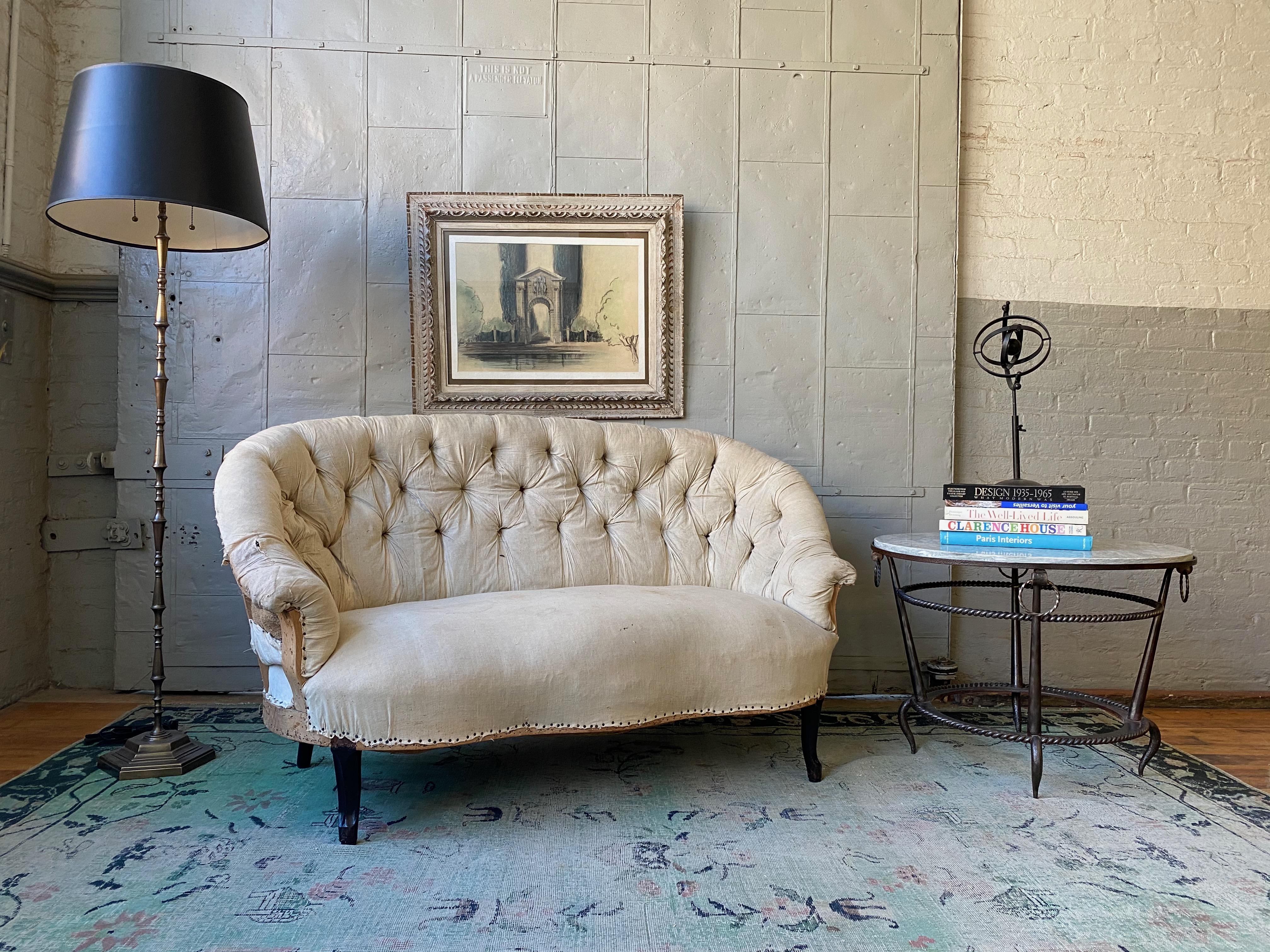 Small sofa with tufted back and cabriole legs, French late 19th century. The sofa is sold as is, but upholstery services are available, price on request.


 