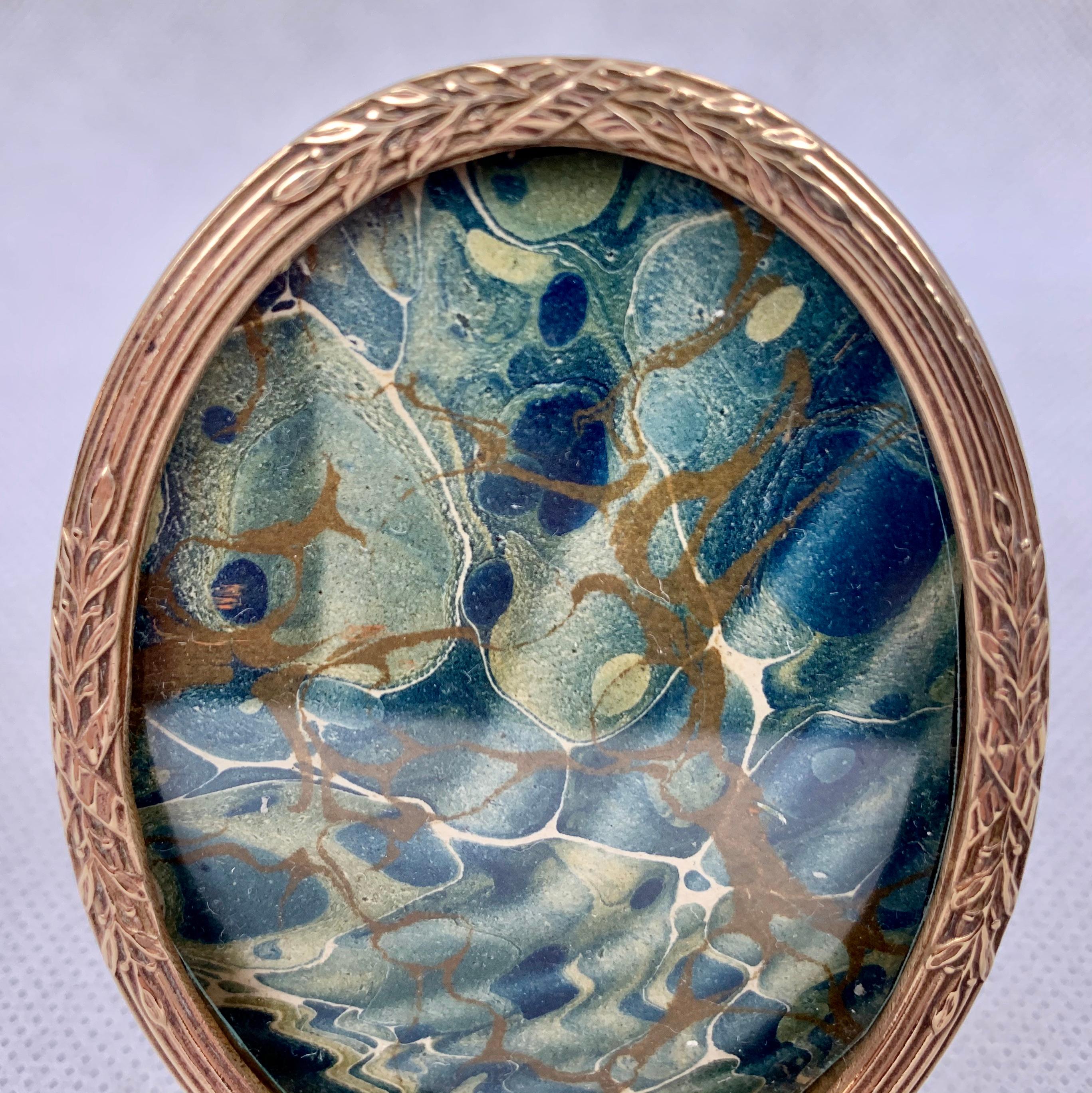 19th Century Small French Oval Louis XVI Gilt Frame with Crossed Ribbons Over Reeds