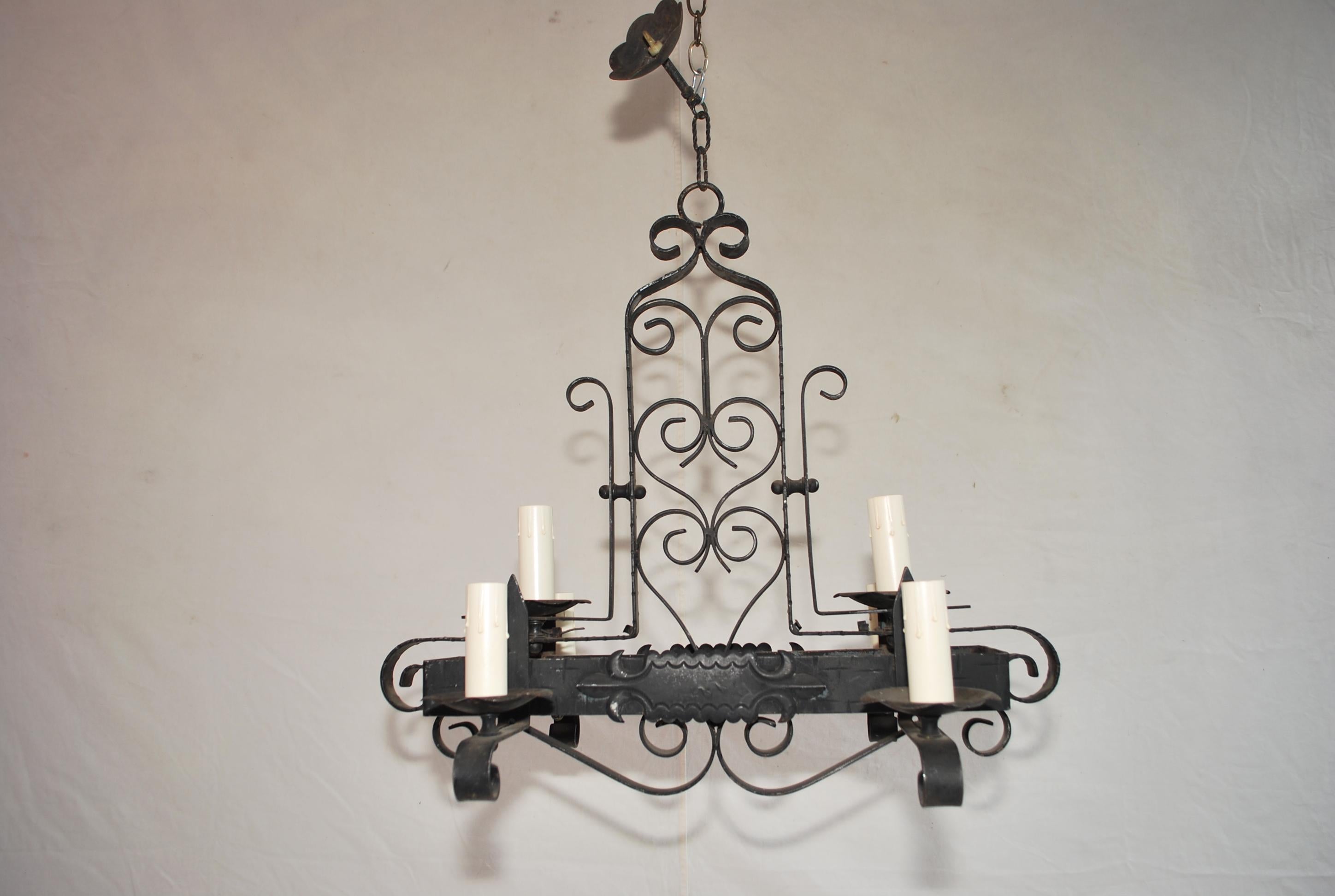 A very nice small rectangular all hand forged French wrought iron chandelier, the patina is allot nicer in person.