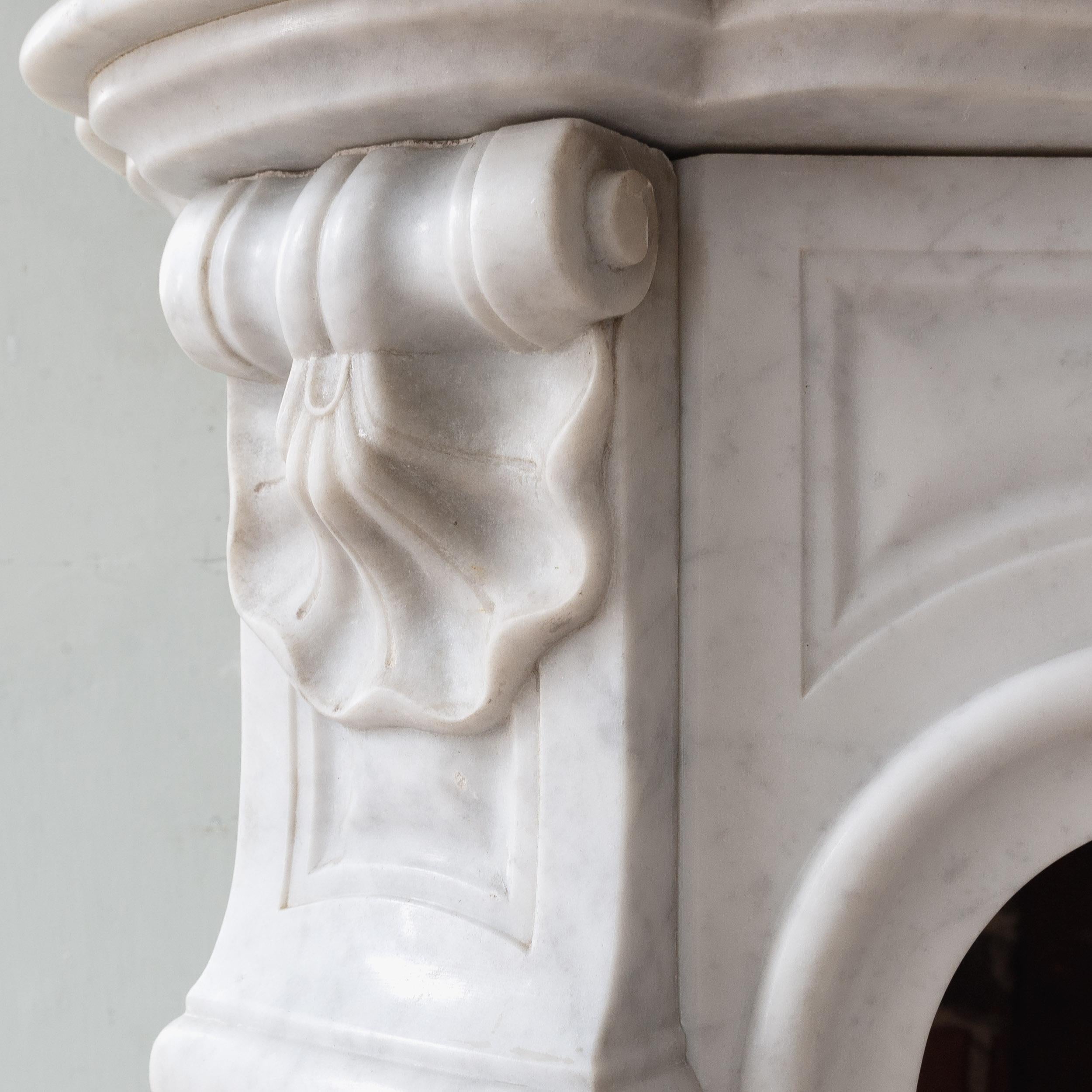 20th Century Small French Rococo Carrara Marble Fireplace For Sale