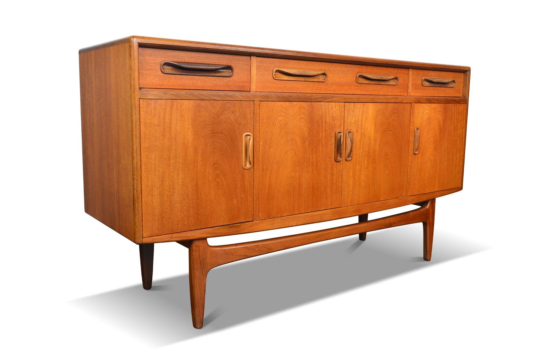 Origin: England
Designer: Victor B. Wilkins
Manufacturer: G Plan
Era: 1960s
Materials: Teak
Measurements: 60? wide x 18? deep x 33? tall

Condition: In excellent original condition with typical wear for its vintage. Price includes restoration