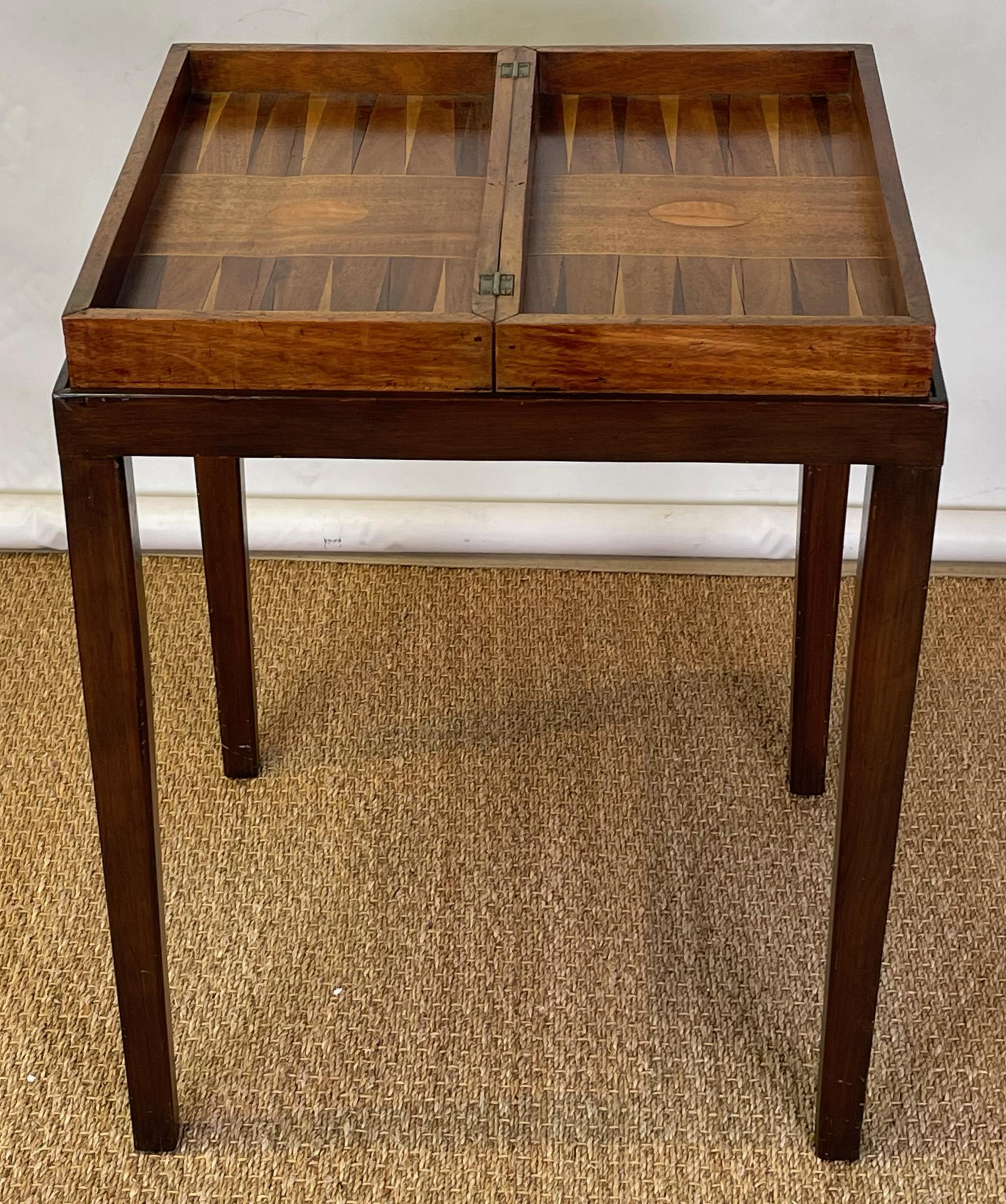 And early 19th C. American Chess, Checkers and Backgammon board fashioned into a games table with later mahogany stand fitted to the board.