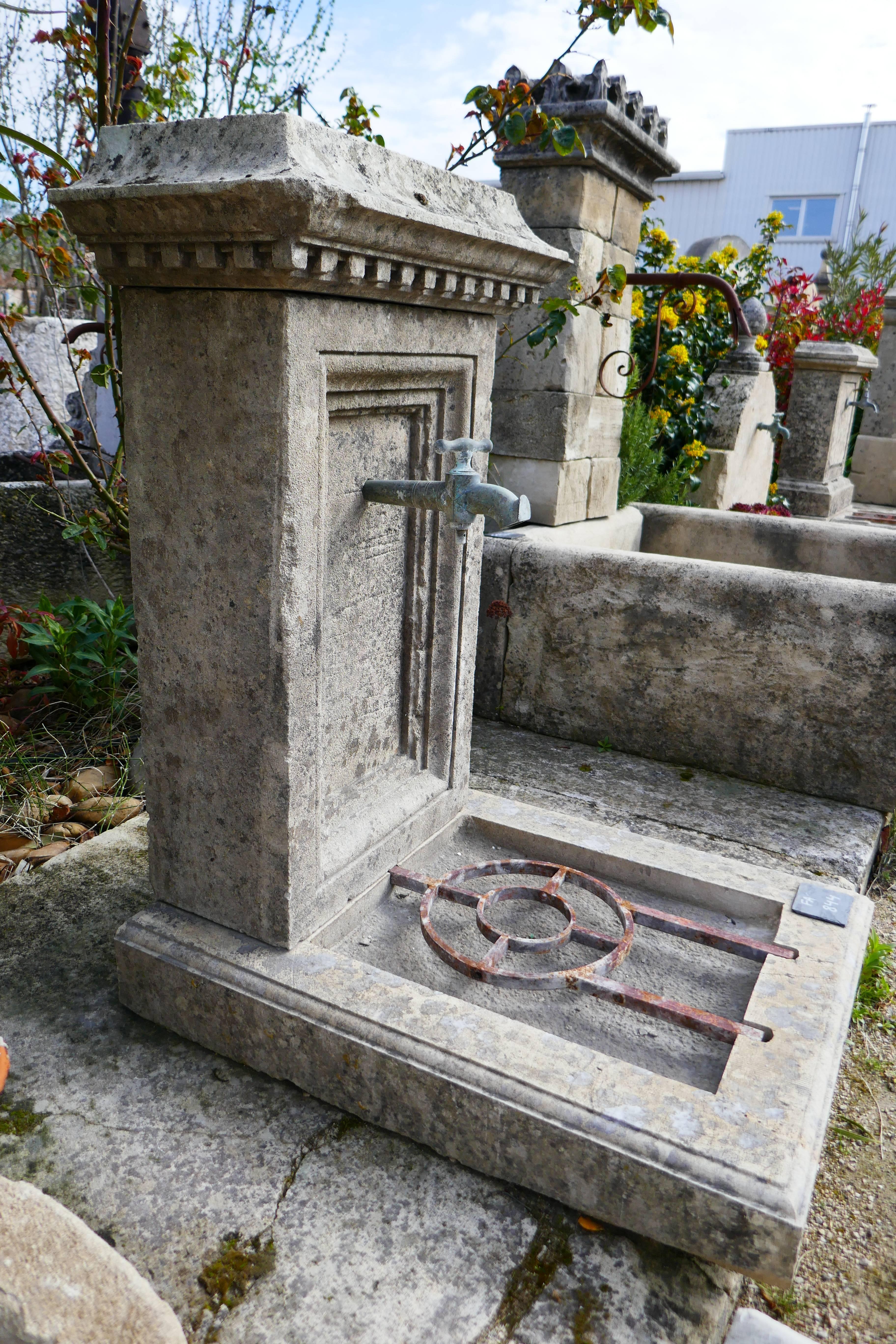 French Small Garden Wall Fountain with Hand-Sculpted Pediment in Aged Stone, Provence For Sale