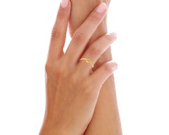 Small garnet cabochon 14k gold ring.