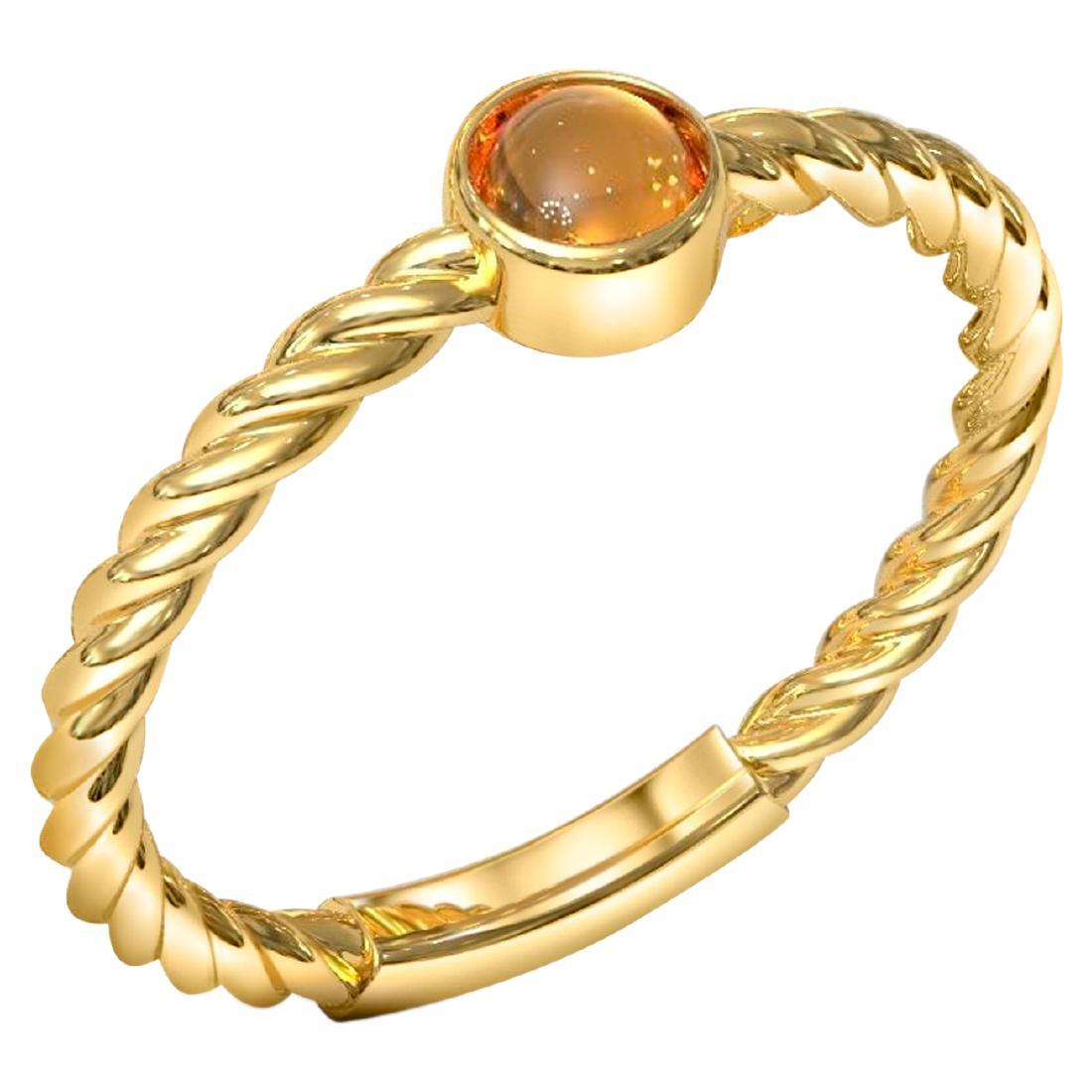 Small garnet cabochon 14k gold ring.
