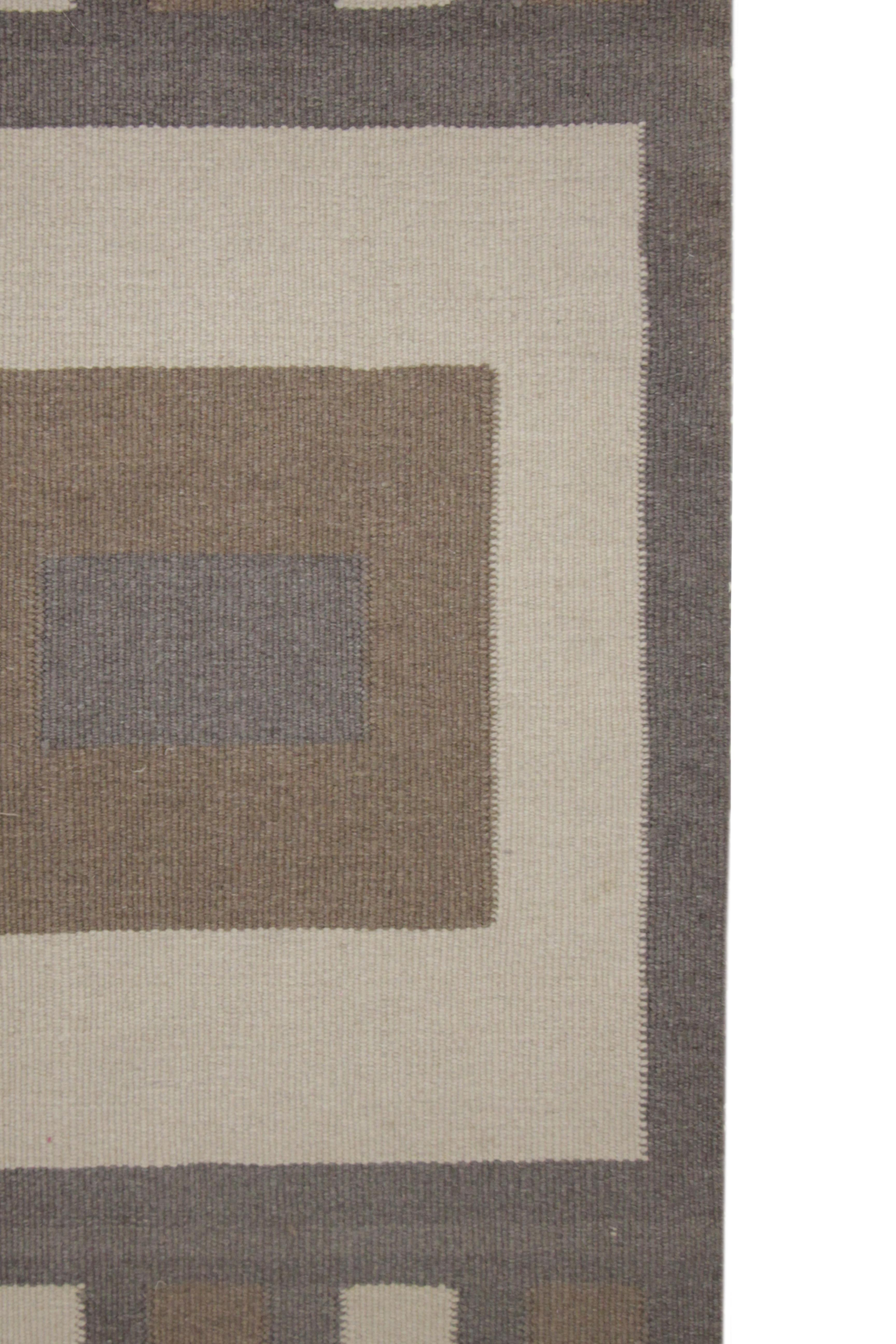 This fine wool mat is the perfect front or back door accessory. Woven by hand with fine wool and cotton that has been dyed with organic vegetable dyeing techniques. The design features a simple beige background with a modern square stripe design.