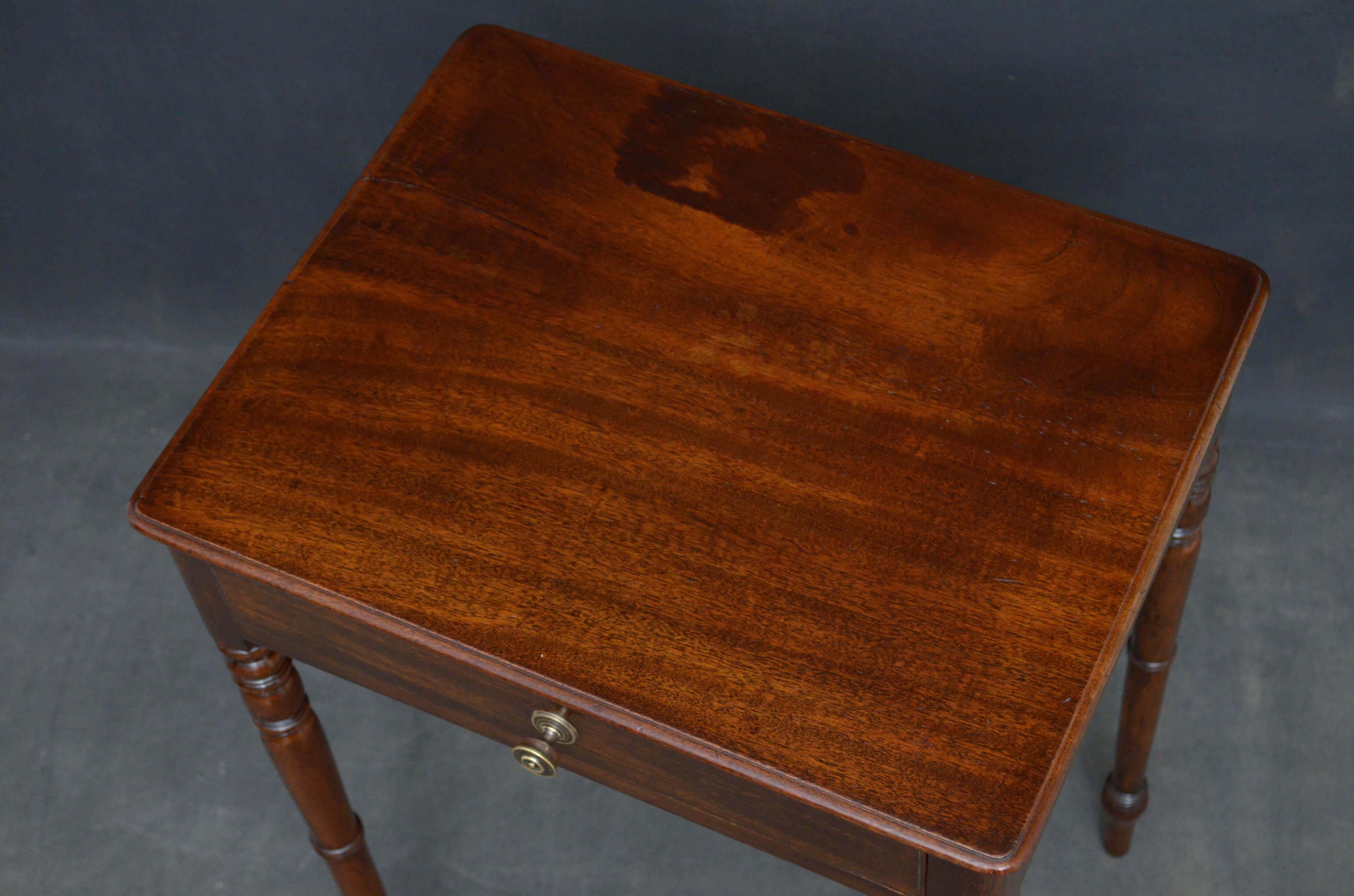 Sn4457, George IV table of simple and restrain design with single piece mahogany top, frieze drawer and slender, turned and ringed legs. This antique table retains its original finish which has been cleaned and revived, circa 1830
Measures: H 28