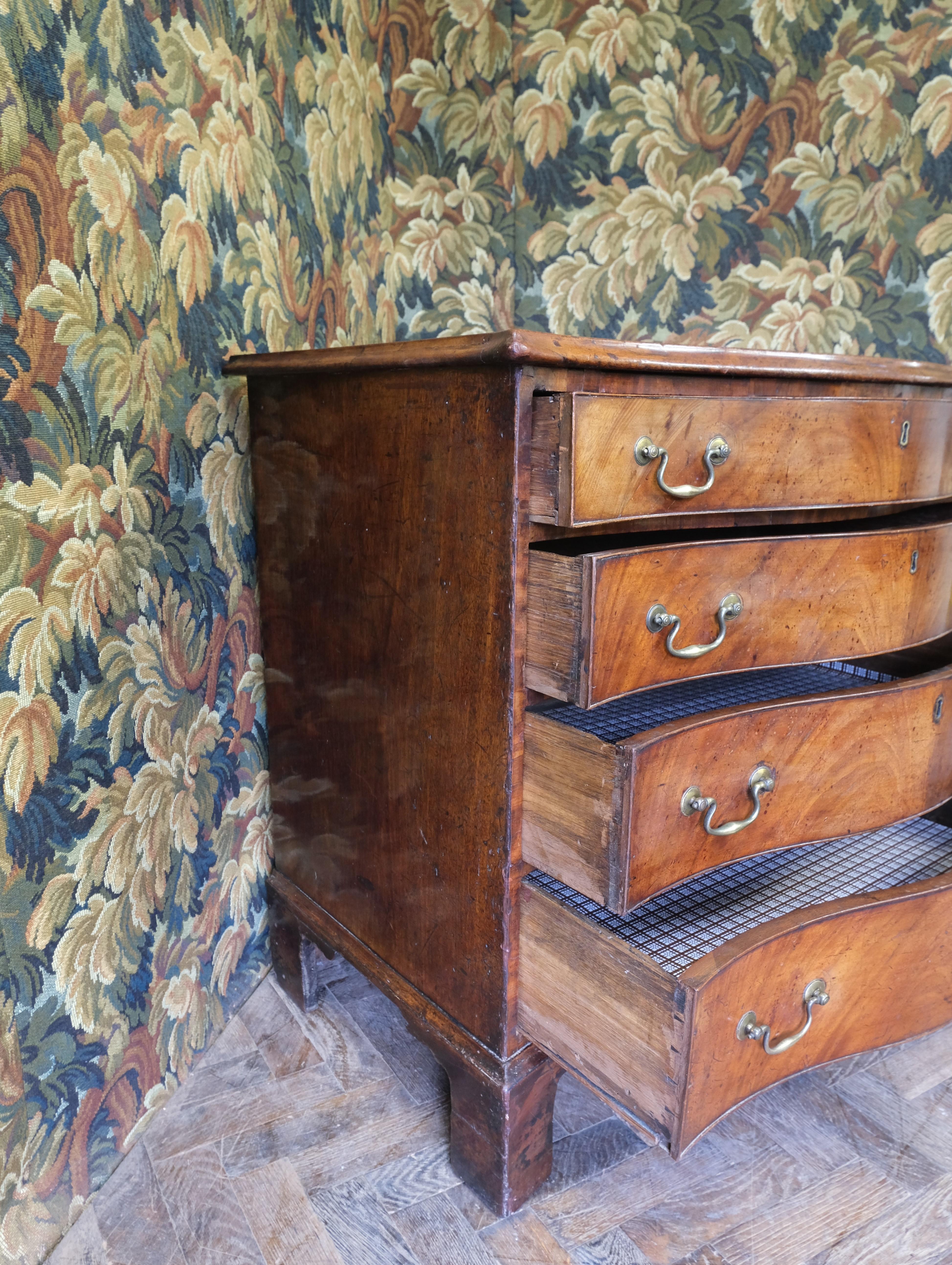 British Small Georgian mahogany serpentine chest of drawers