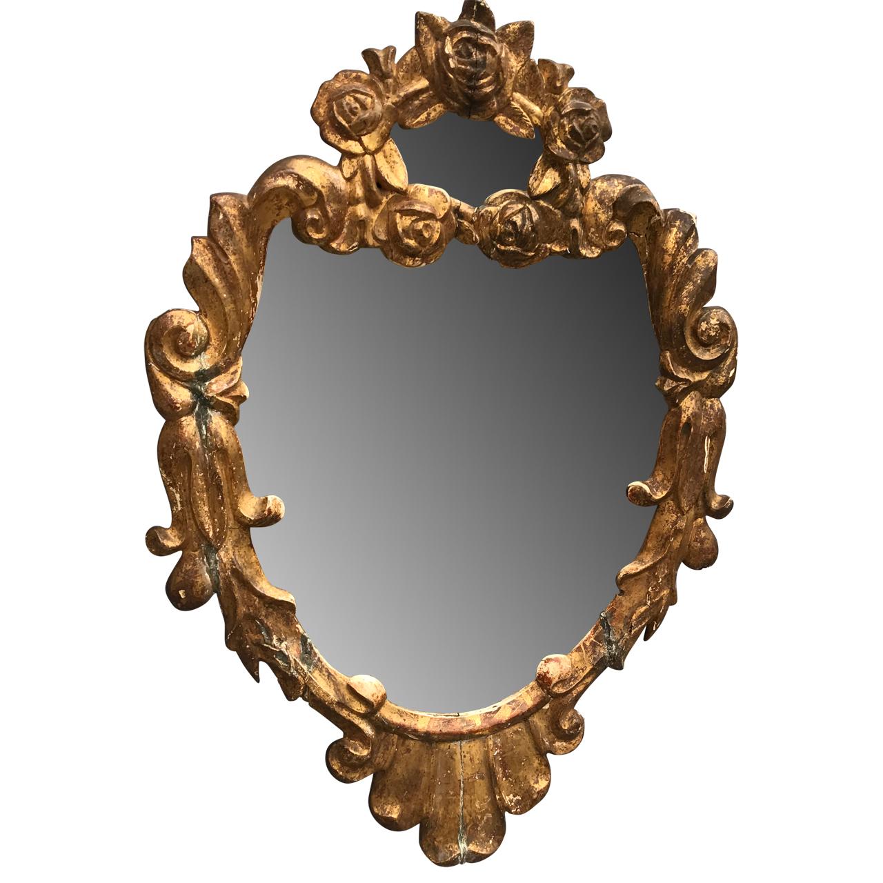 Small 19th century Italian gold-leaf gilded wall mirror.