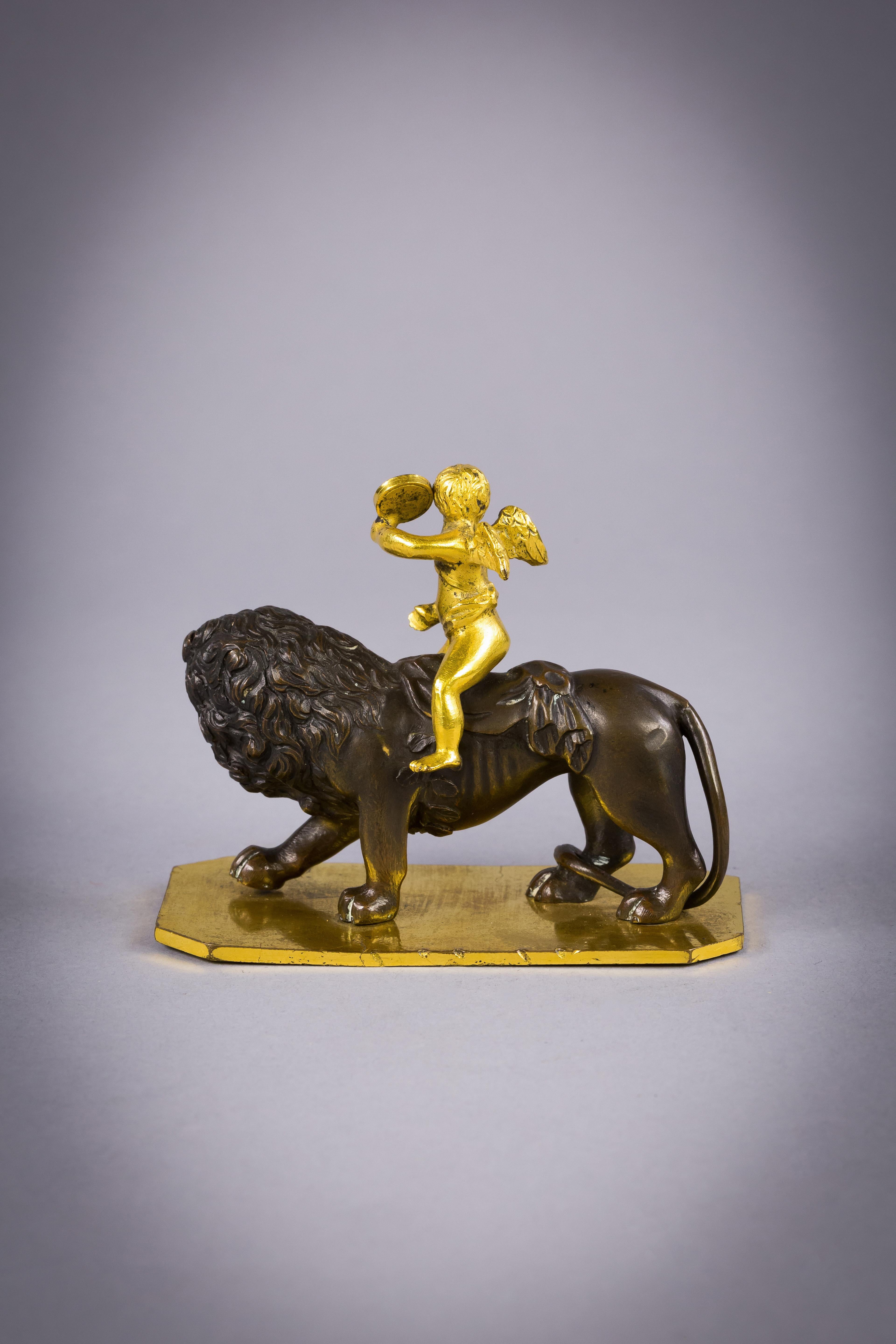 Small Gilt and Patinated Bronze of Cupid on a Lion, circa 1820 In Excellent Condition For Sale In New York, NY