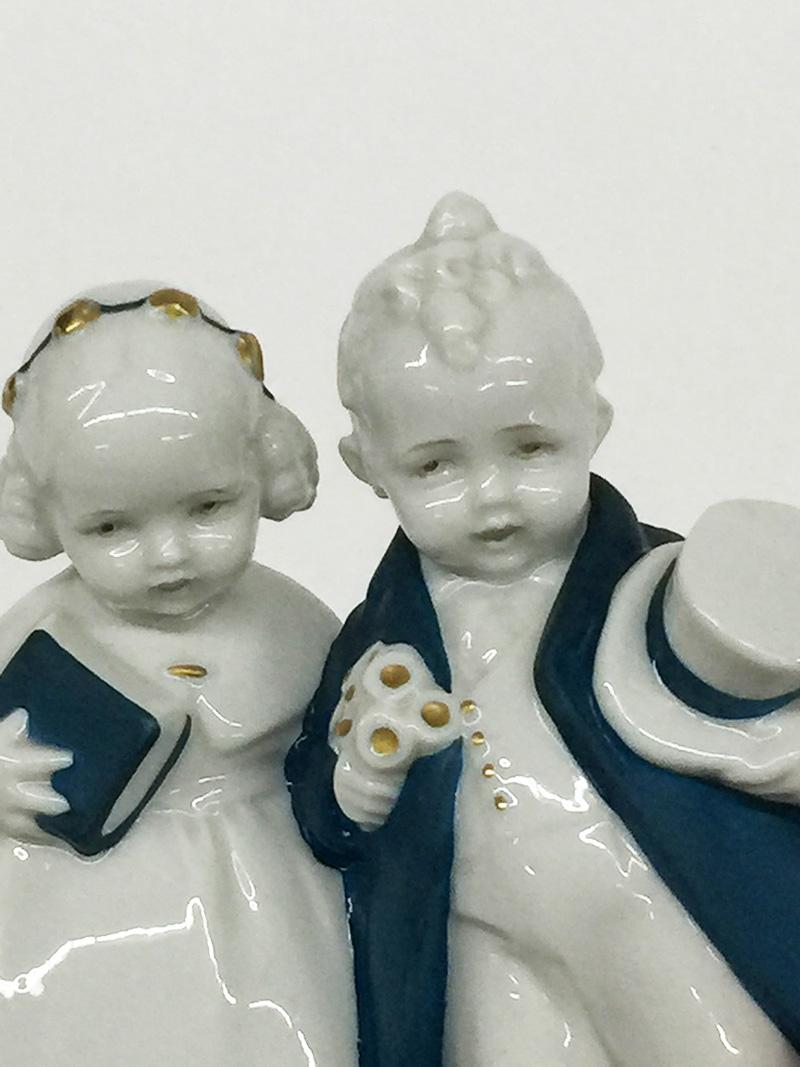 Porcelain figurine by Katzhütte for Hertwig & Co, 1920-1930

A lovely small porcelain figurine by Katzhütte for Hertwig & Co, Germany
1920-1930. A white porcelain with gold and blue paint. The blue paint on the porcelain is a matte color
The mark is